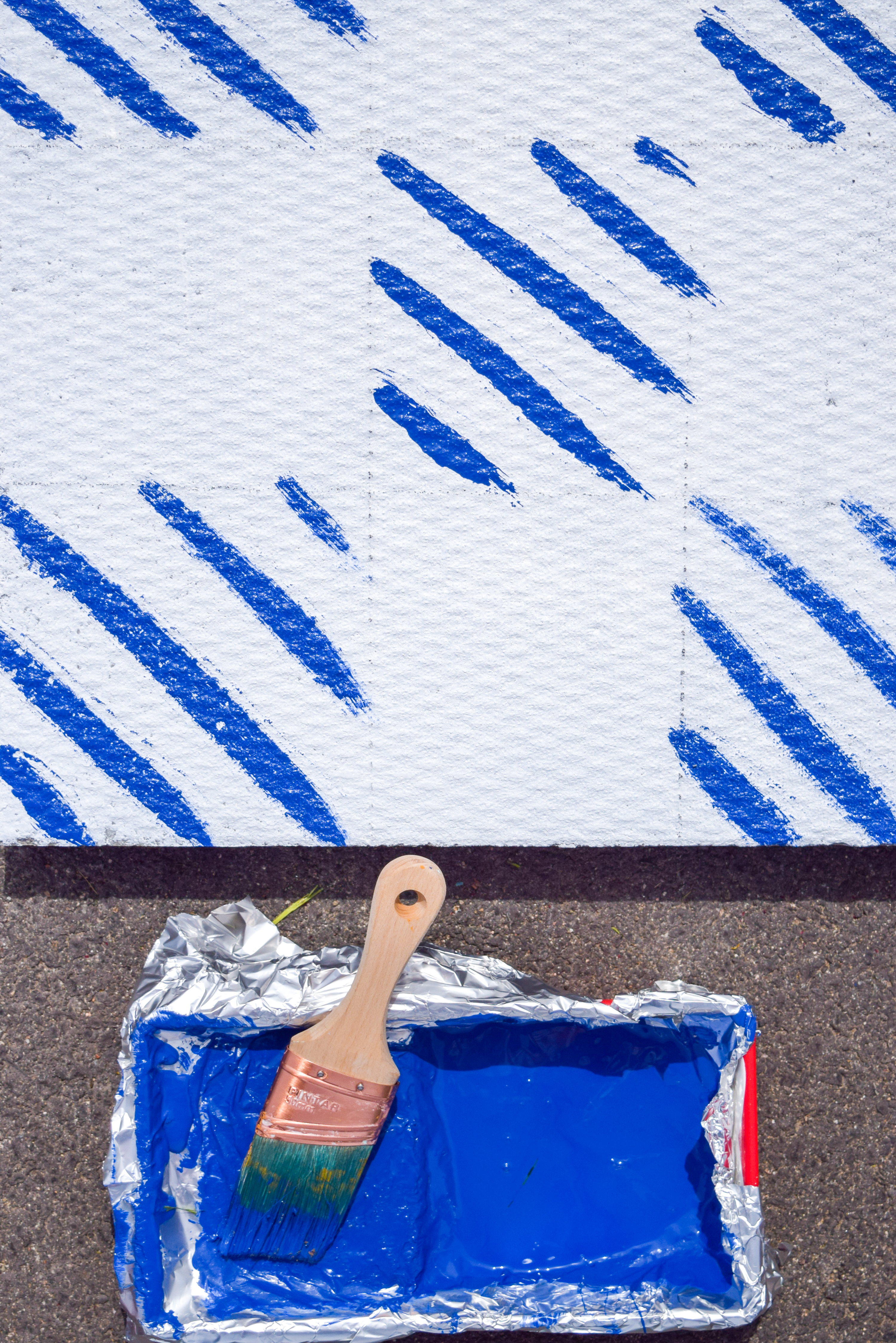 Looking for a renter friendly update to your backyard in time for summer? Try painted some cement pavers to look like patio tiles, using Decoart's Curb Appeal line of paints.