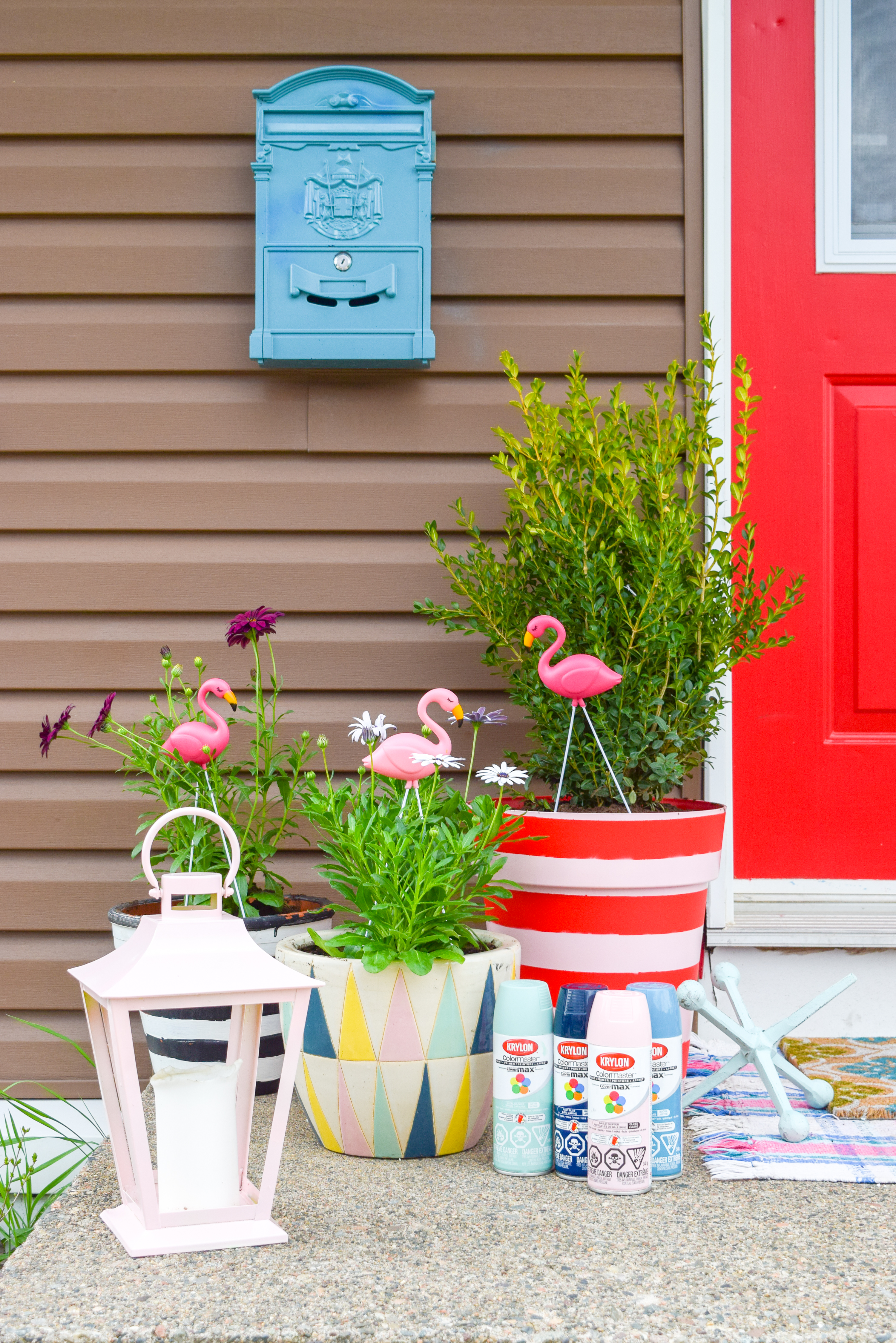 Create the colour coordinated front porch situation of your dreams with DIY spray painted striped planters using the Krylon & Tiffany Pratt colour collection.