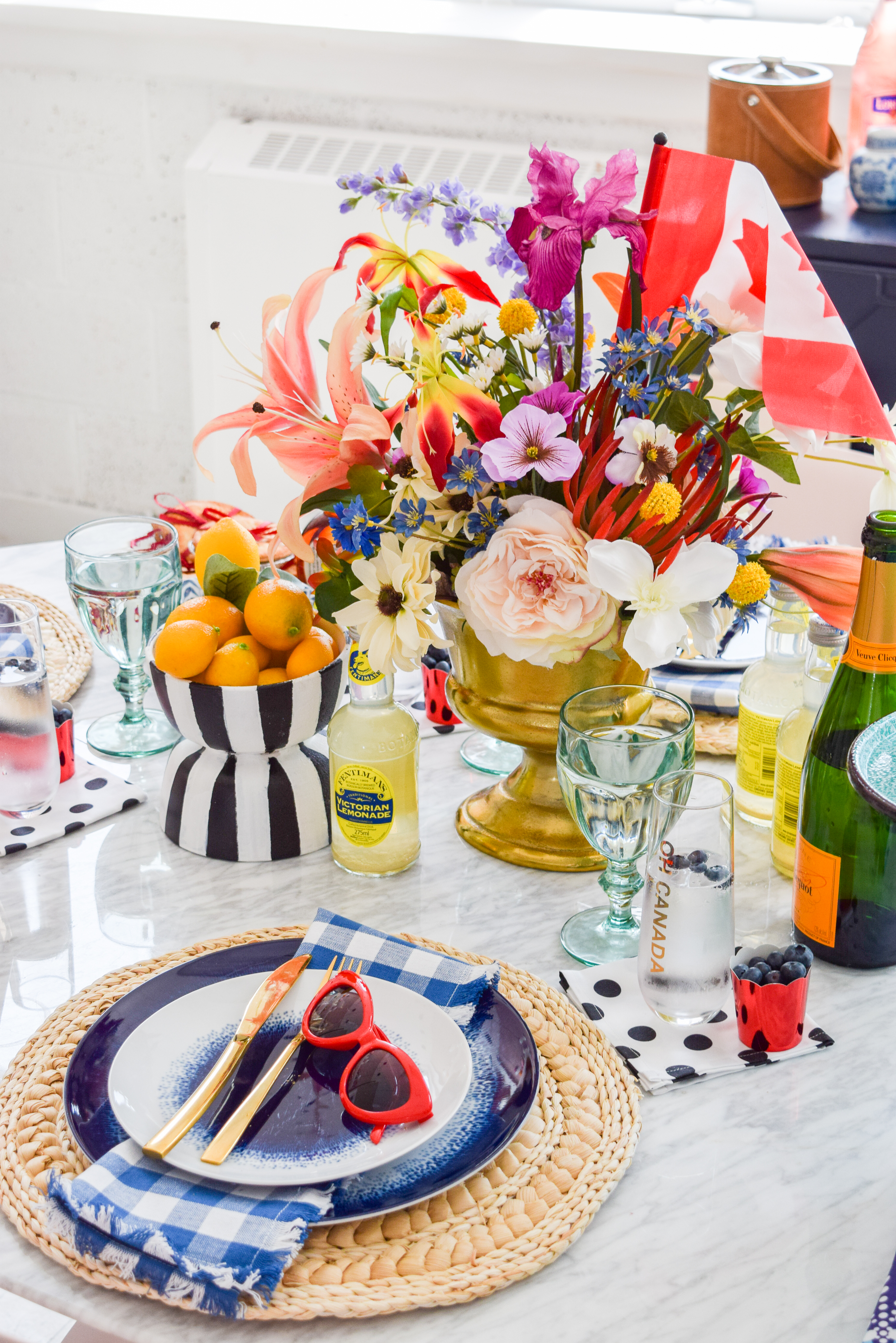 A patriotic Canada Day Blue & Floral Tablescape, that bristles with personality. Bold colours, great patterns, and traditional touches make it personal. I capped it off with Homesense finds, and Roostery linens. Grab some for yourself!