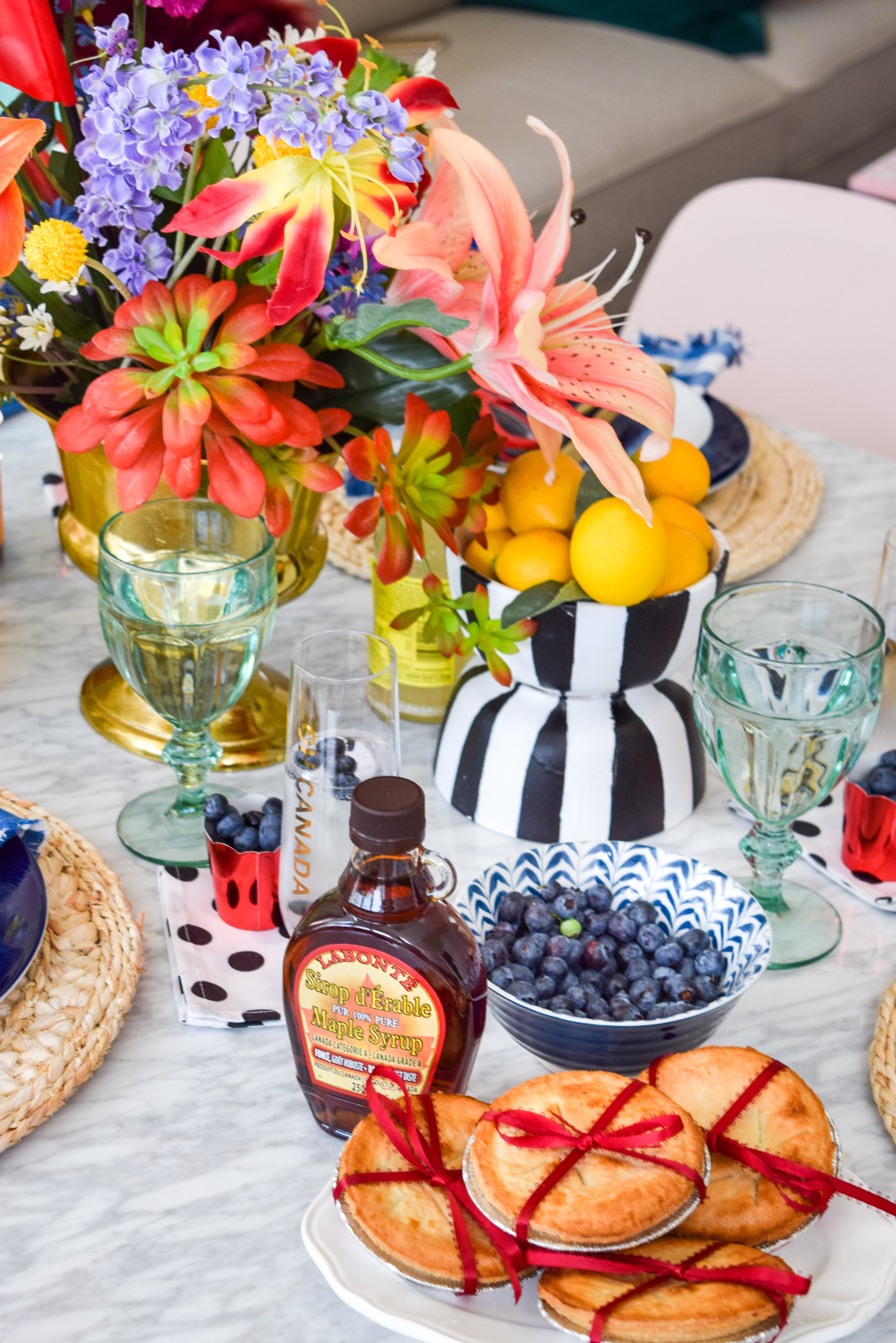 A patriotic Canada Day Blue & Floral Tablescape, that bristles with personality. Bold colours, great patterns, and traditional touches make it personal. I capped it off with Homesense finds, and Roostery linens. Grab some for yourself!