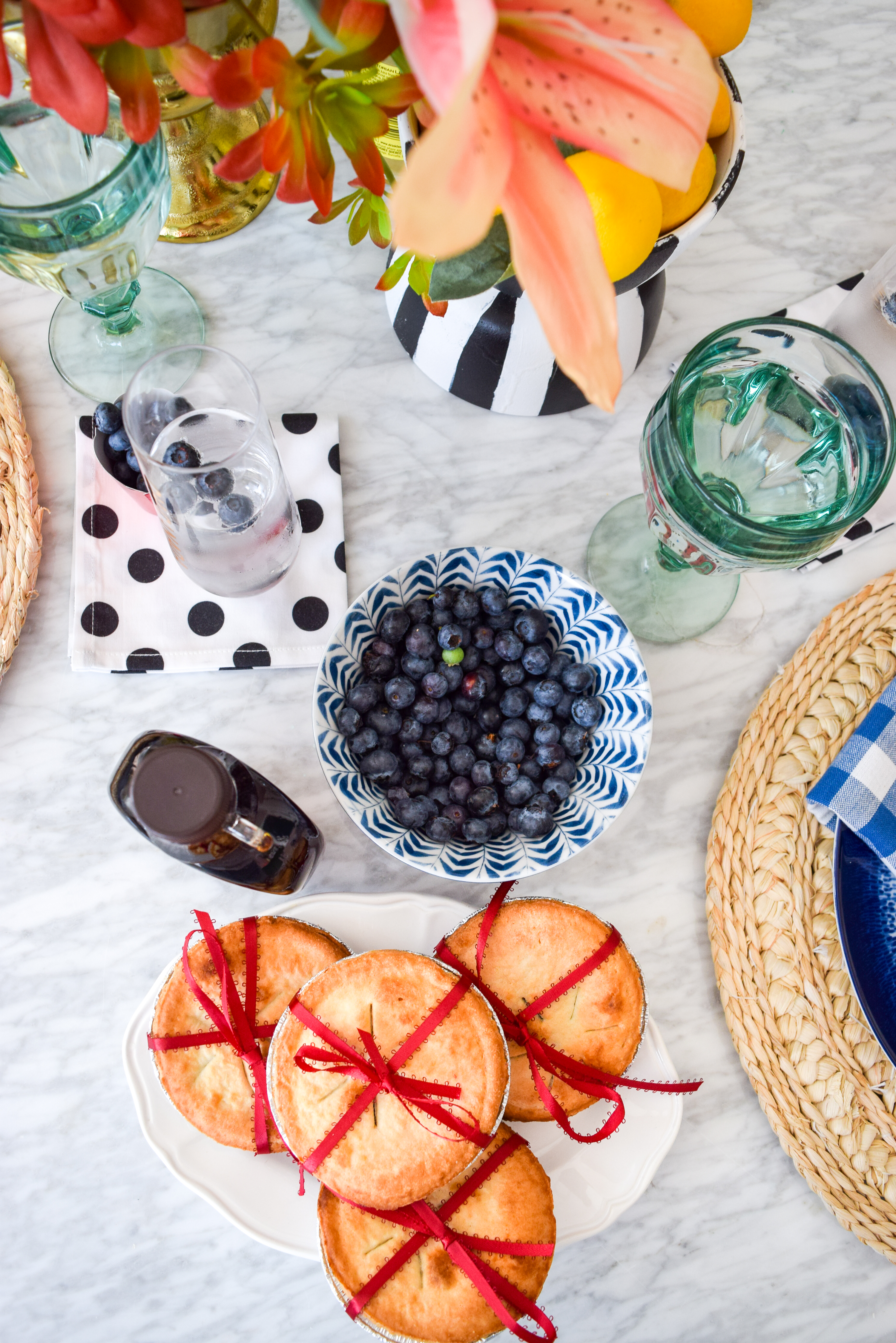 A patriotic Canada Day Blue & Floral Tablescape, that bristles with personality. Bold colours, great patterns, and traditional touches make it personal. I capped it off with Homesense finds, and Roostery linens. Grab some for yourself!