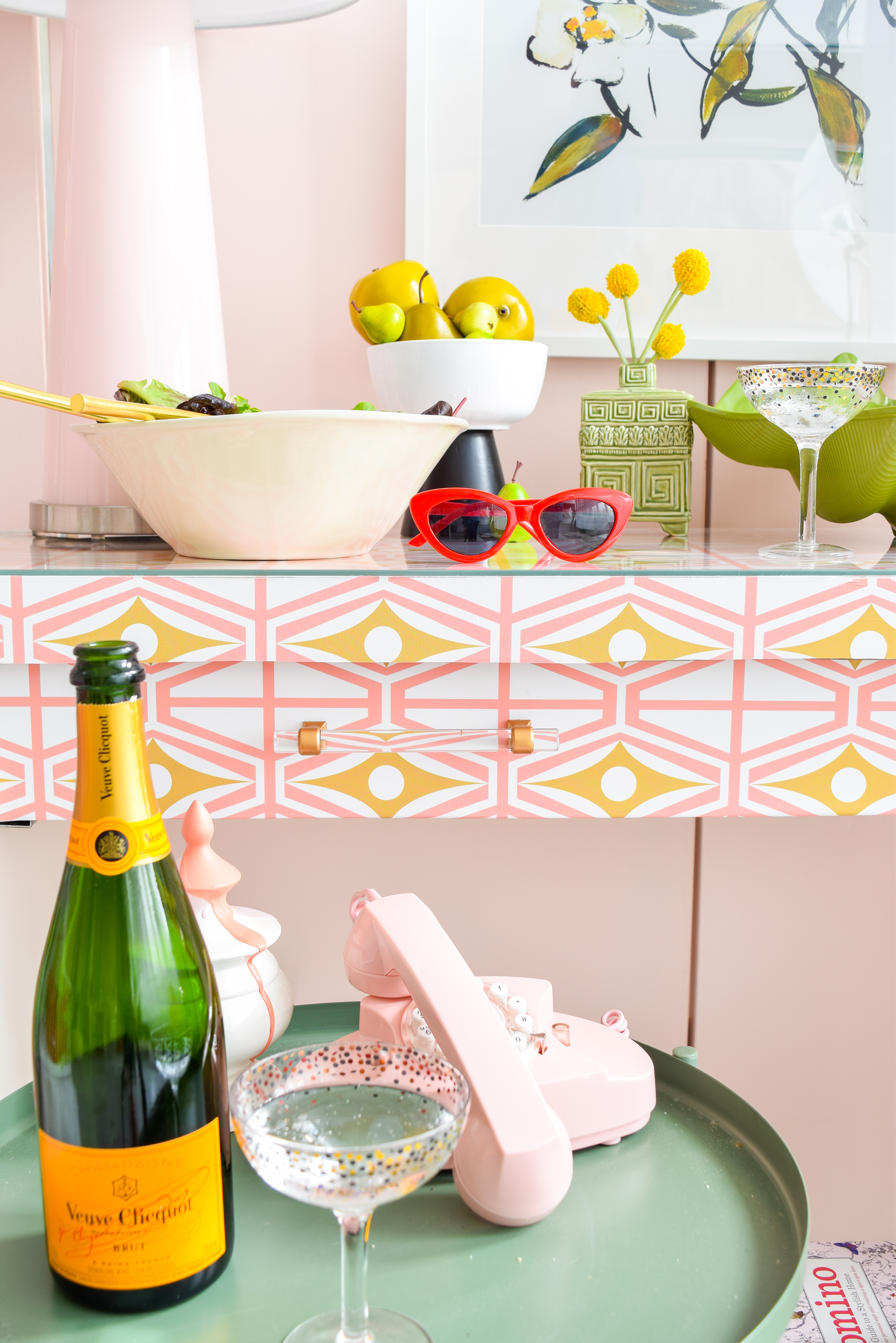 Breathe new life into some old IKEA furniture with fresh hardware, and a bold print. DIY an IKEA Sideboard Hack using Spoonflower's removable wallpaper designs, coupled with Liberty Brand Hardware, to create a striking piece, and an entertaining classic: a movable bar cart and sideboard.