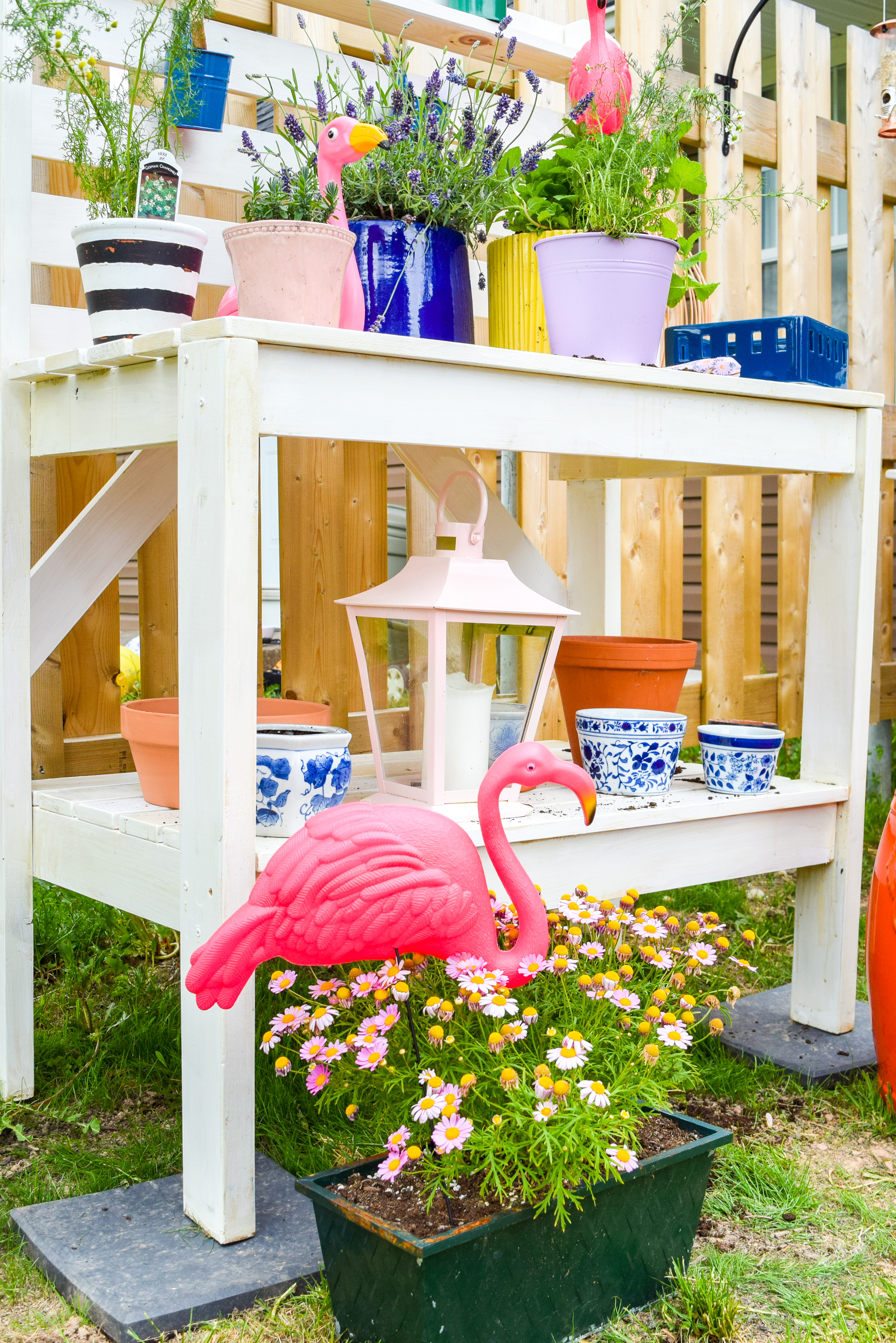 Looking for mosquito relief without all the candles and sprays? Try these mosquito repellent planters full of herbs and plants that keep them at bay. While you're at it, give your potting bench an update with a stylish white wash and a proper top coat to see it through the weather.