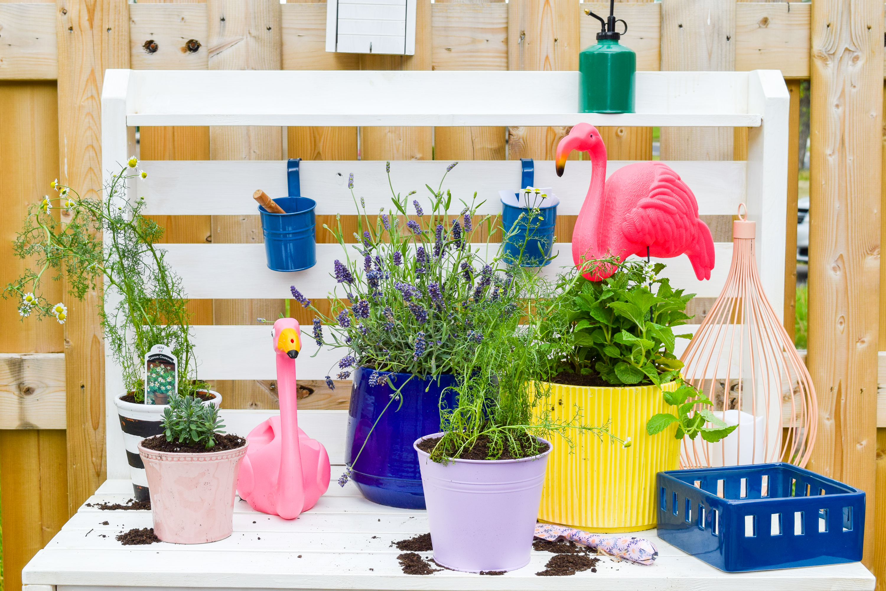 Looking for mosquito relief without all the candles and sprays? Try these mosquito repellent planters full of herbs and plants that keep them at bay. While you're at it, give your potting bench an update with a stylish white wash and a proper top coat to see it through the weather.