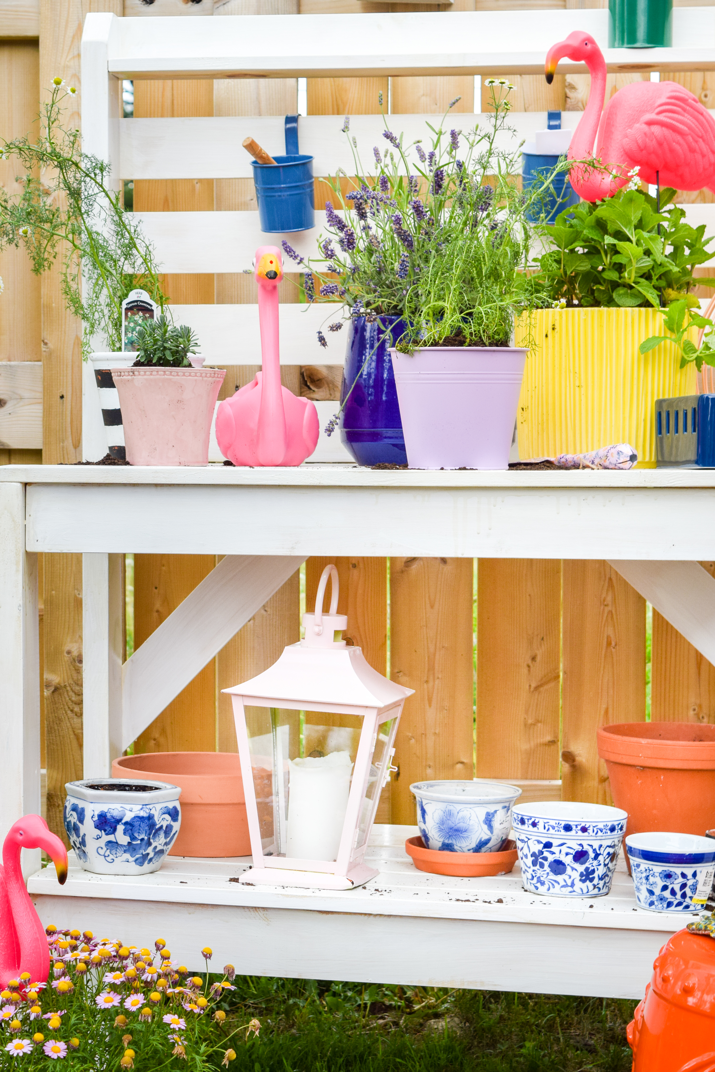 Looking for mosquito relief without all the candles and sprays? Try these mosquito repellent planters full of herbs and plants that keep them at bay. While you're at it, give your potting bench an update with a stylish white wash and a proper top coat to see it through the weather.