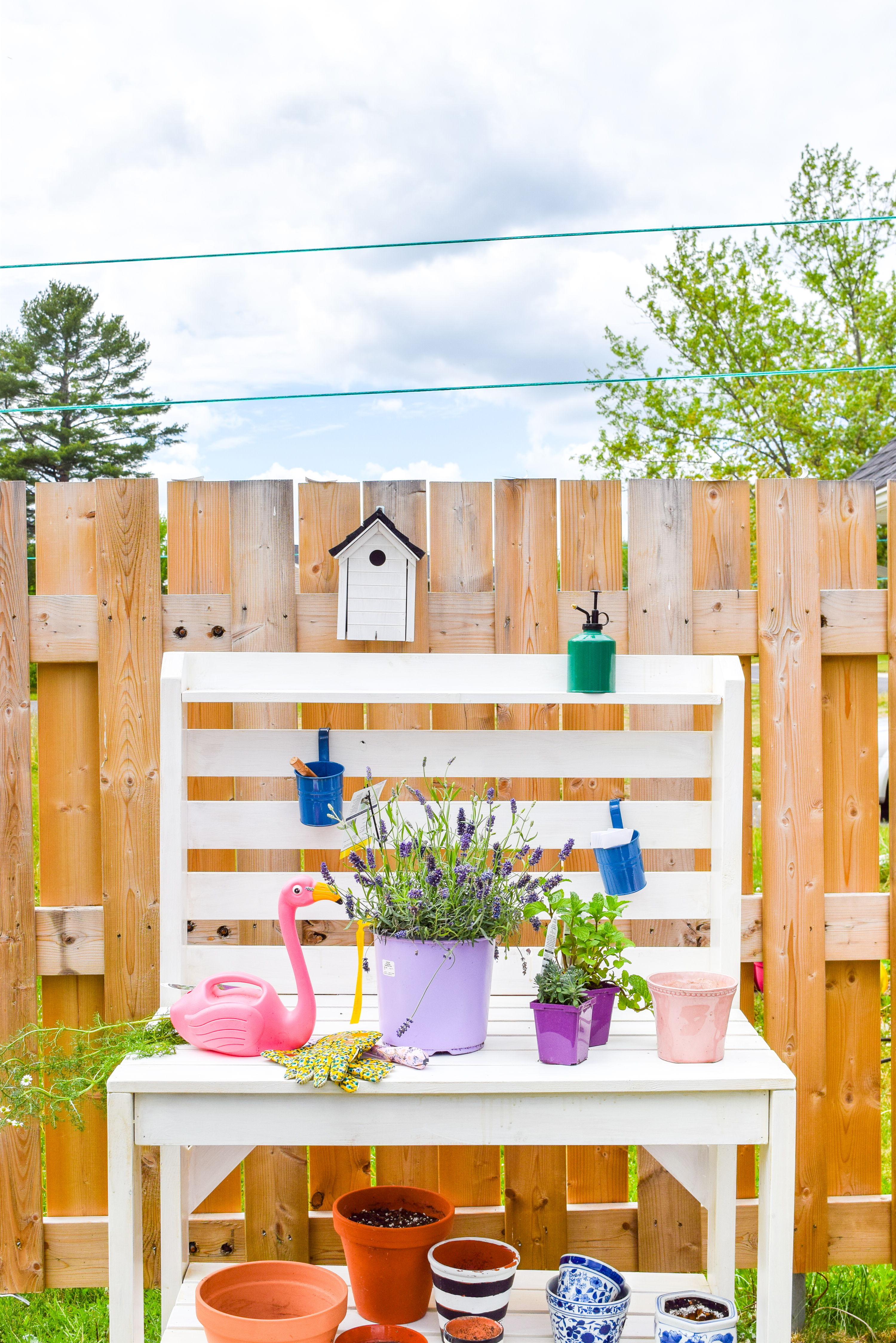 Looking for mosquito relief without all the candles and sprays? Try these mosquito repellent planters full of herbs and plants that keep them at bay. While you're at it, give your potting bench an update with a stylish white wash and a proper top coat to see it through the weather.