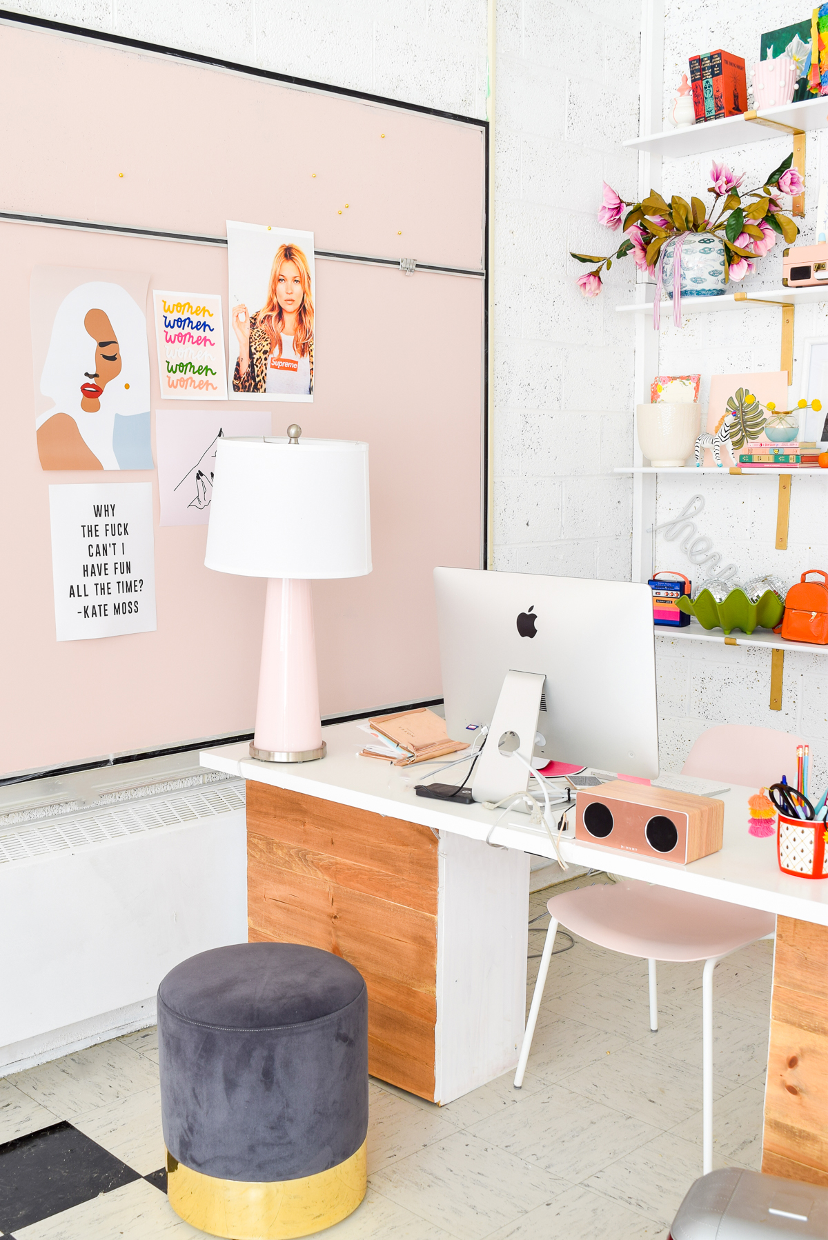 Who would have thought that gold shelf brackets would have kicked-off a pink & gold office revamp? Full of bright colours, gold, playful touches and accessories from women owned stores, what's not to love? side shot of a desk next to a pink chalkboard