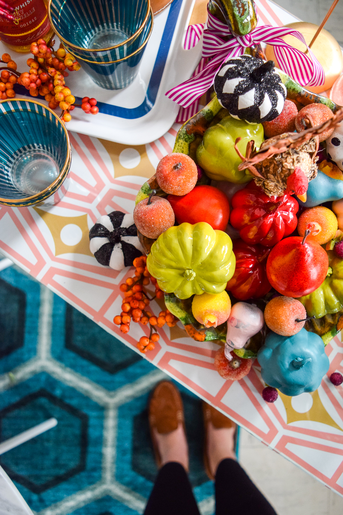 downwards view of a sidetable with a colourful cornucopia