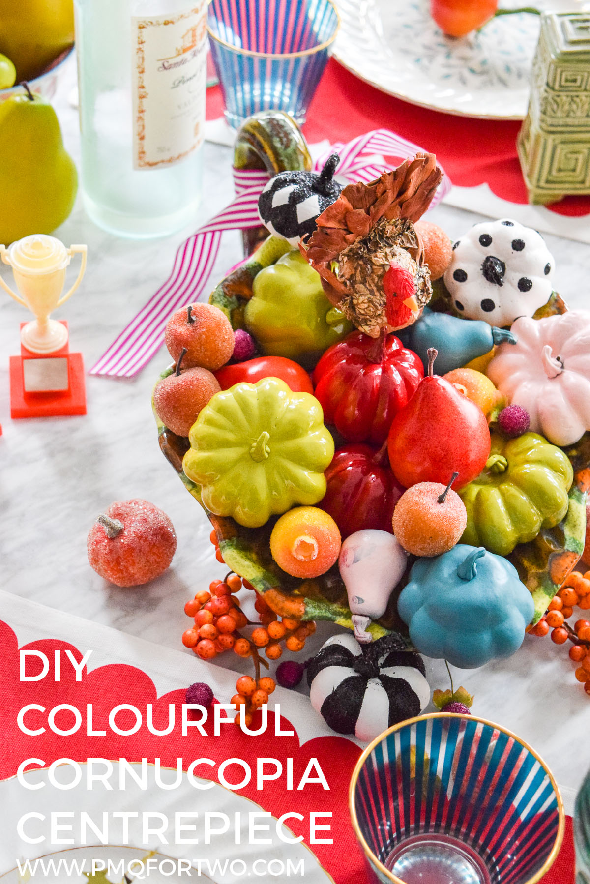 pinterest cover image of a colourful cornucopia at the center of a table