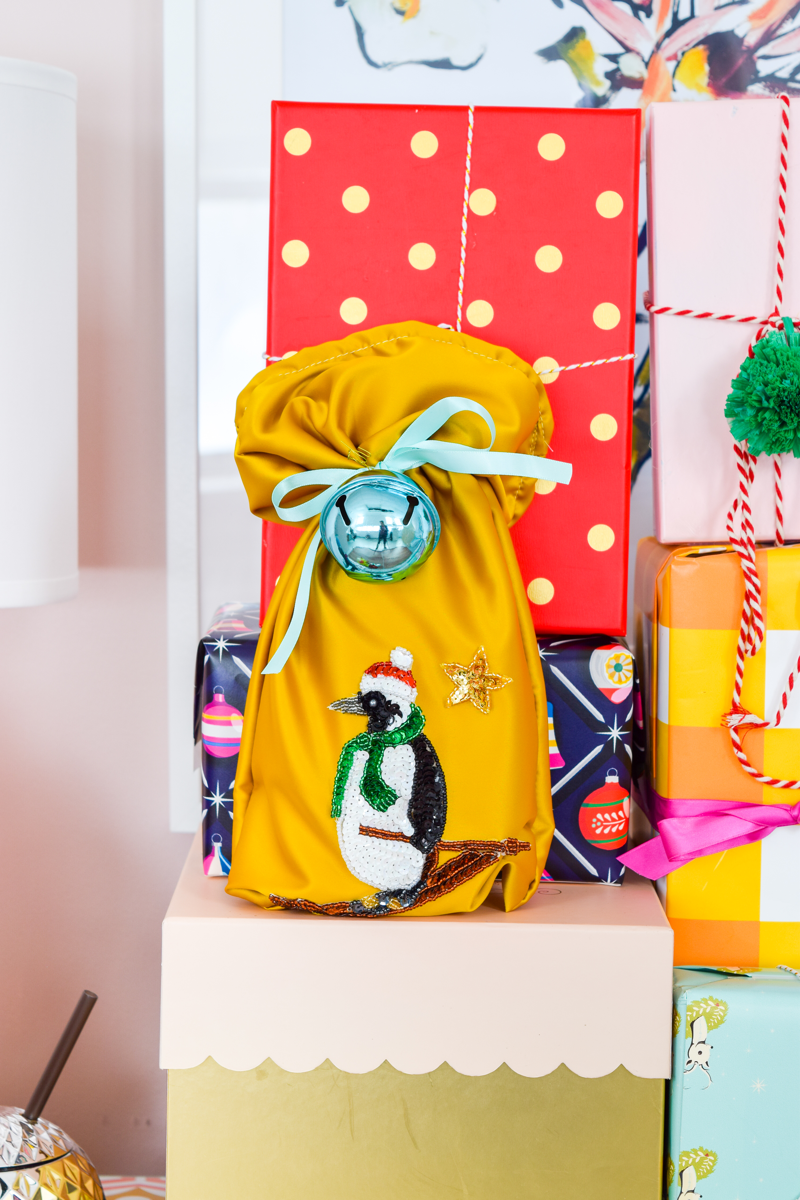 Ho ho ho! Santa wants more than just milk and cookies this year, he wants a fancy bottle of something something — and it better come in a DIY Christmas Wine Bottle Bag with skiing Penguin Applique!