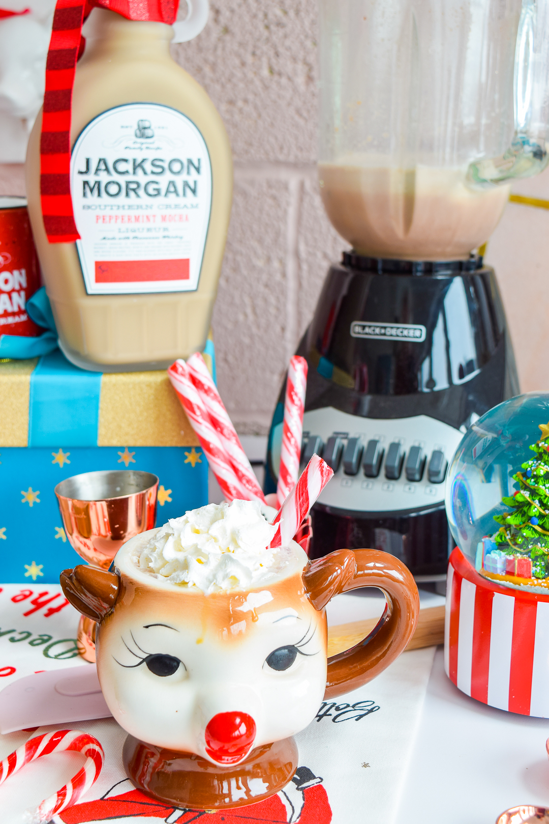 Girl, if you have not made a batch of these whiskey peppermint mocha frozen hot chocolates by the time you're done reading the post, you're doing it wrong. Jackson Morgan's Southern Cream is a tasty addition to any seasonal beverage, and it MAKES this one. #peppermintmocha #jacksonmorgan