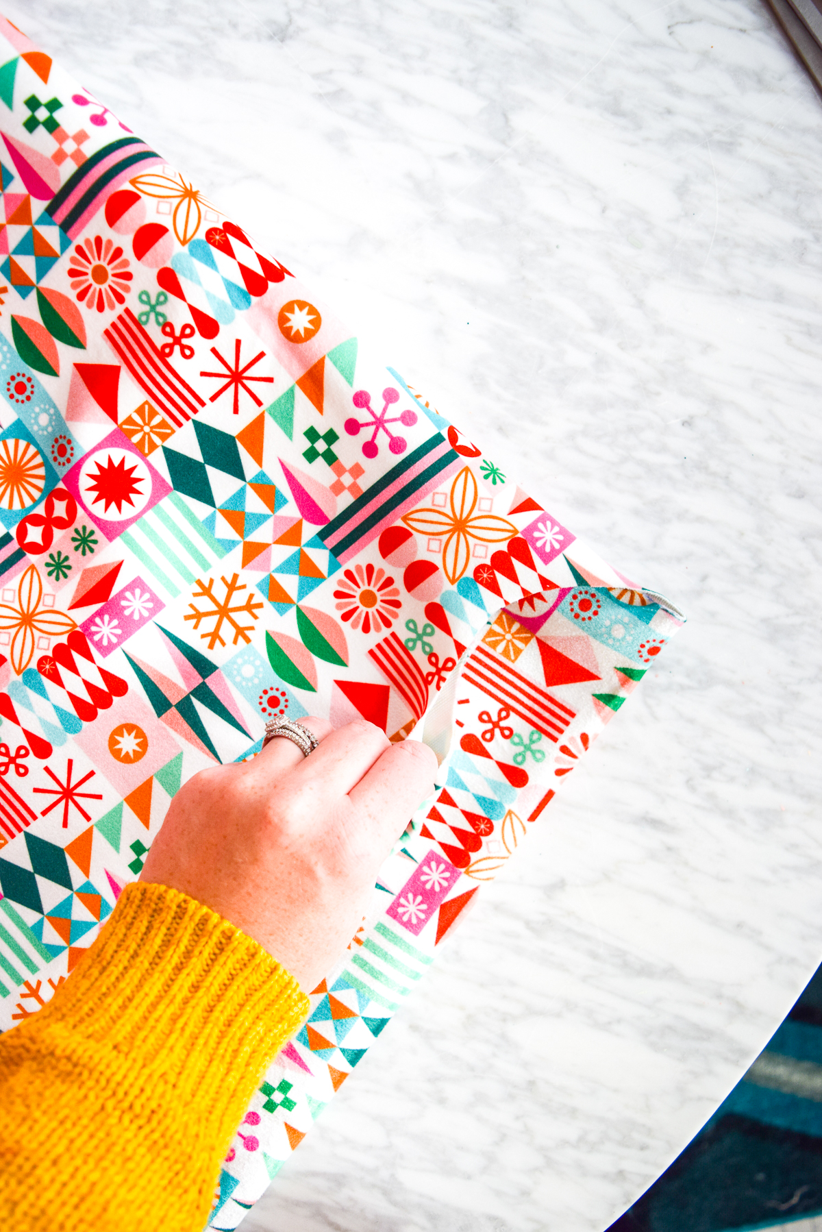 Have you ever wondered how to sew a Christmas tree skirt? It's super easy. This tutorial is for you, if you're not impressed with the what's in stores. All you need is 2yrds of velvet fabric from Spoonflower. #christmastreeskirt #treeskirt