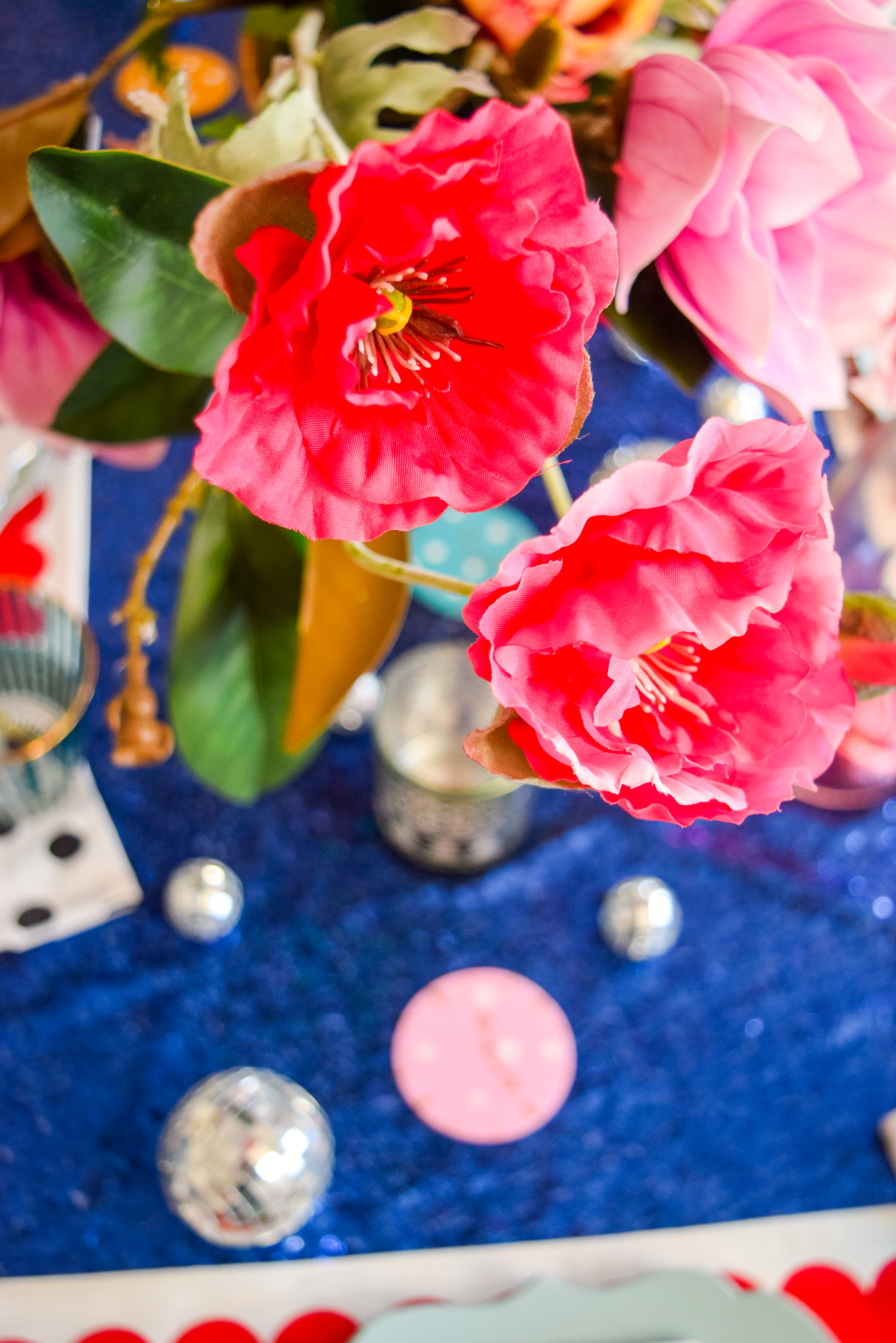  For my Kate Spade New Years Eve Tablescape you bet I went glitzy and colourful, and invited an inflatable flamingo in a Santa hat. Come see what else is shaking!