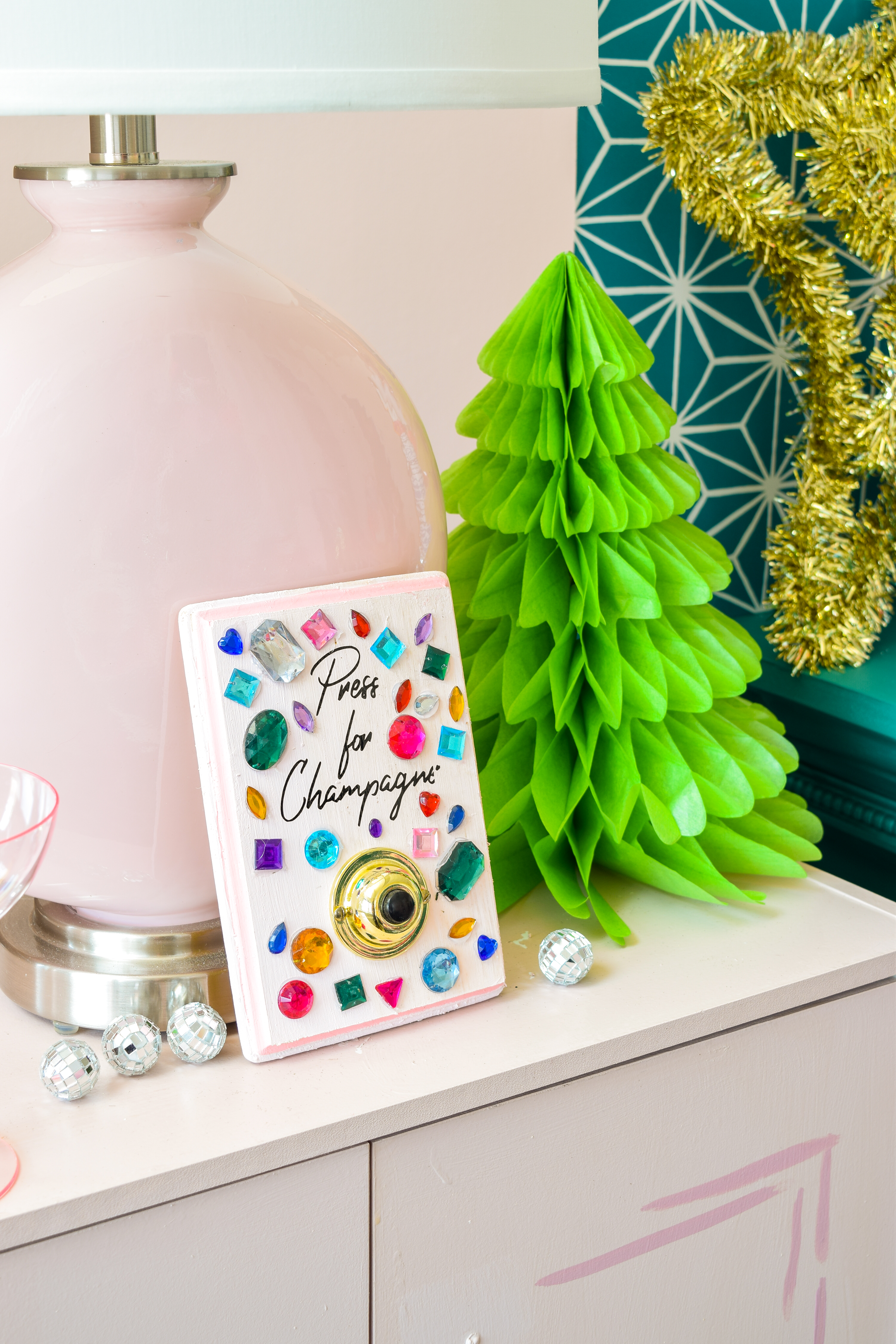  For my Kate Spade New Years Eve Tablescape you bet I went glitzy and colourful, and invited an inflatable flamingo in a Santa hat. Come see what else is shaking!