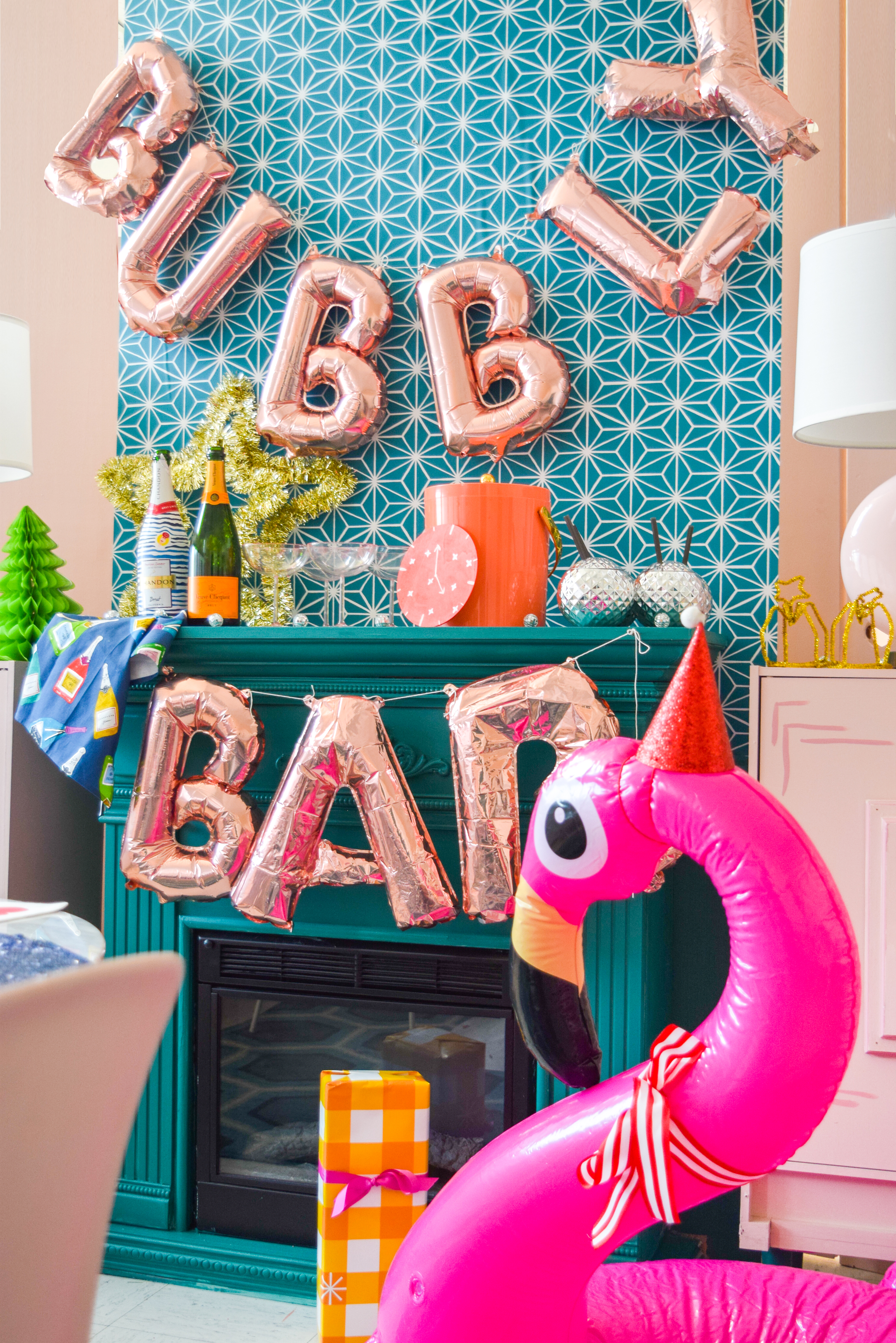  For my Kate Spade New Years Eve Tablescape you bet I went glitzy and colourful, and invited an inflatable flamingo in a Santa hat. Come see what else is shaking!