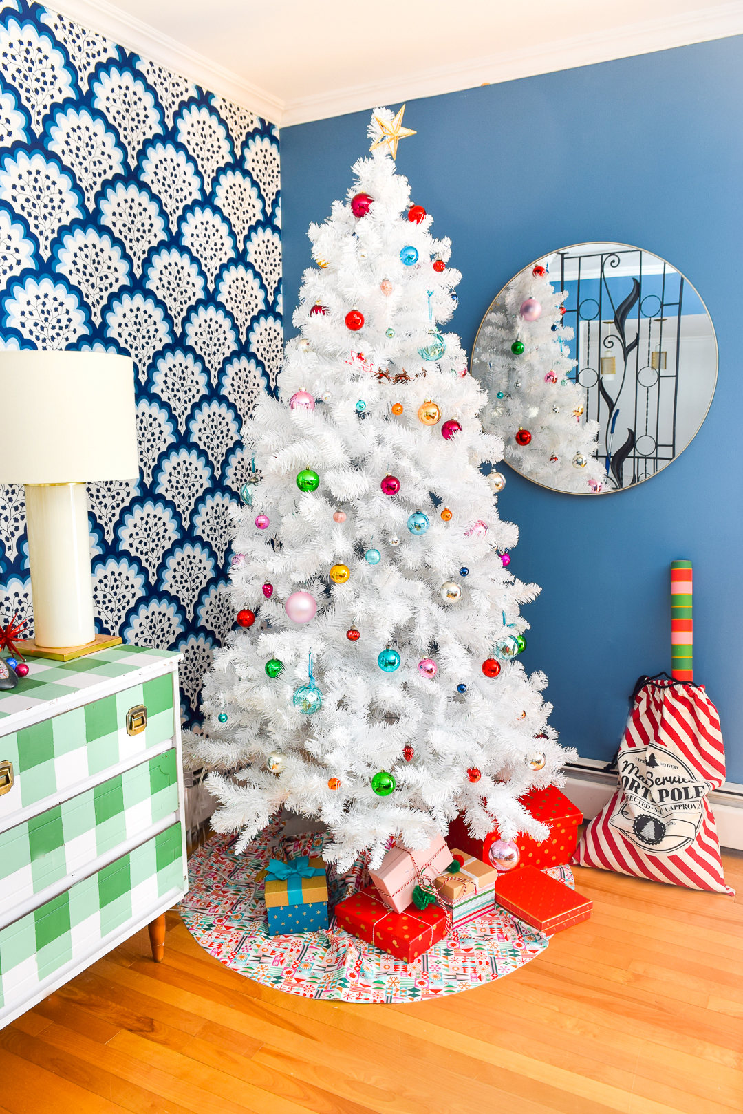 I've got the tree up, the ornaments out, and am showing an odd amount of restraint this year when it comes to accessorizing. Come check out my Retro & Colourful Christmas Living Room! #christmastour #christmasdecor #colourfulchristmas