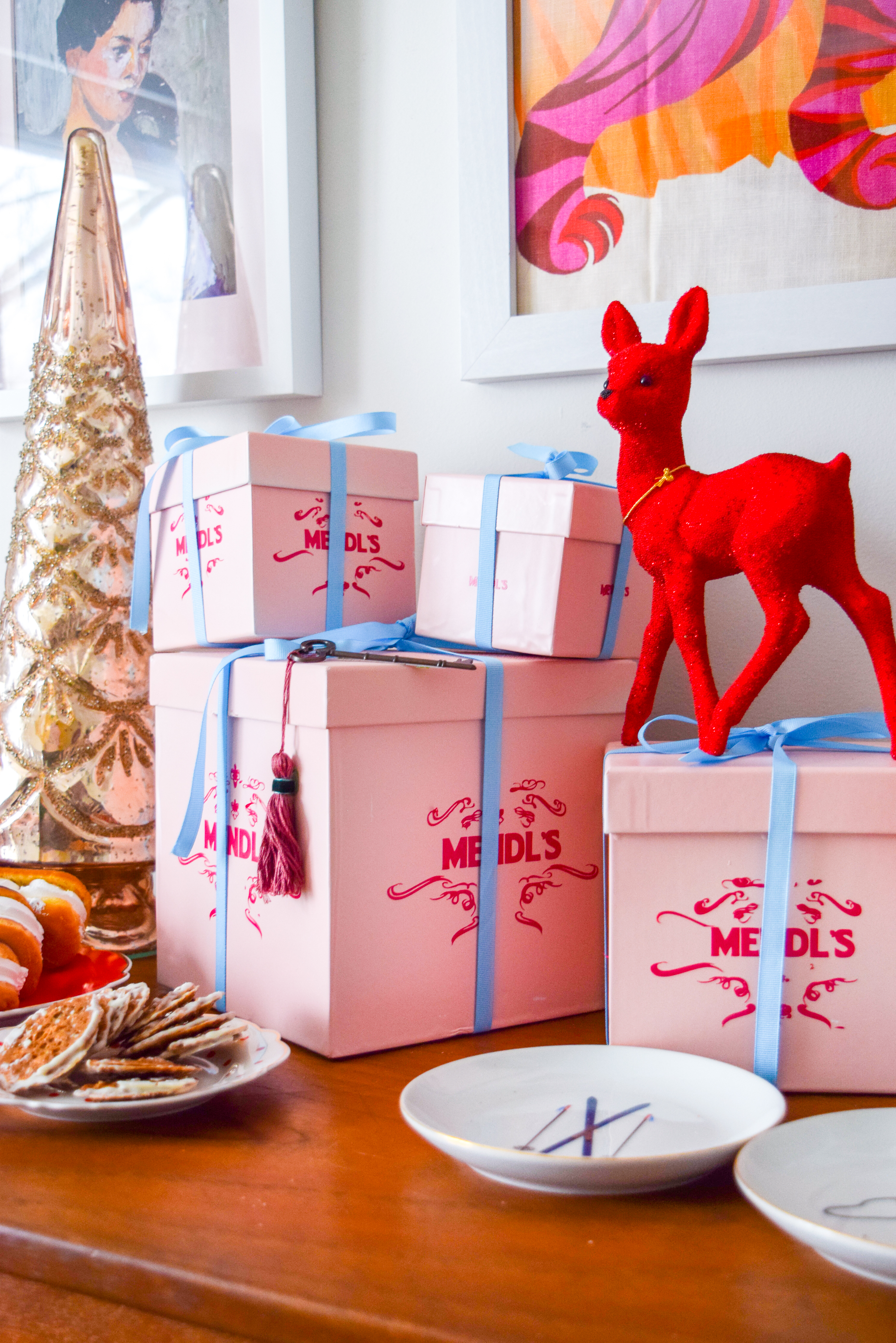 Celebrate the never ending winter with a Grand Budapest Hotel Party! Pinks, Purples and reds are all you need, and maybe some of those Mendl's boxes too.