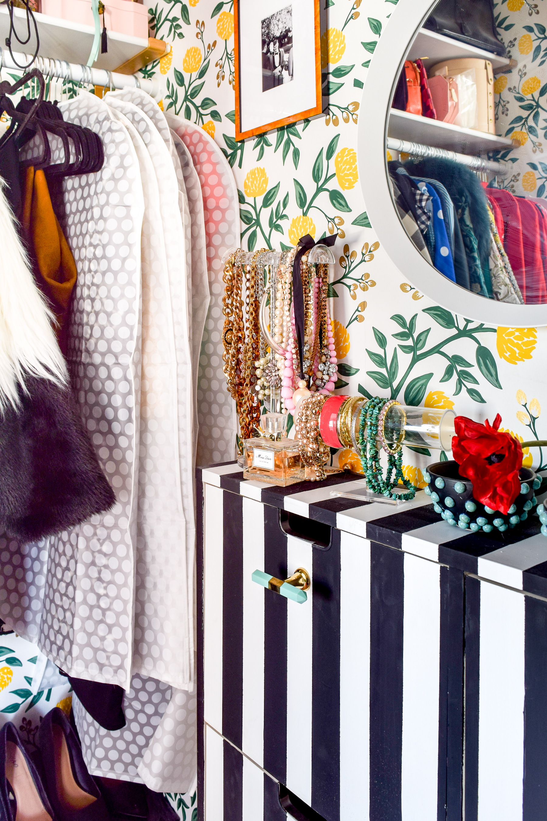 A Floral Glam Master Closet is something we all need, especially when it comes with gold shelf brackets from Crates & Pallet that look oh-so-chic.