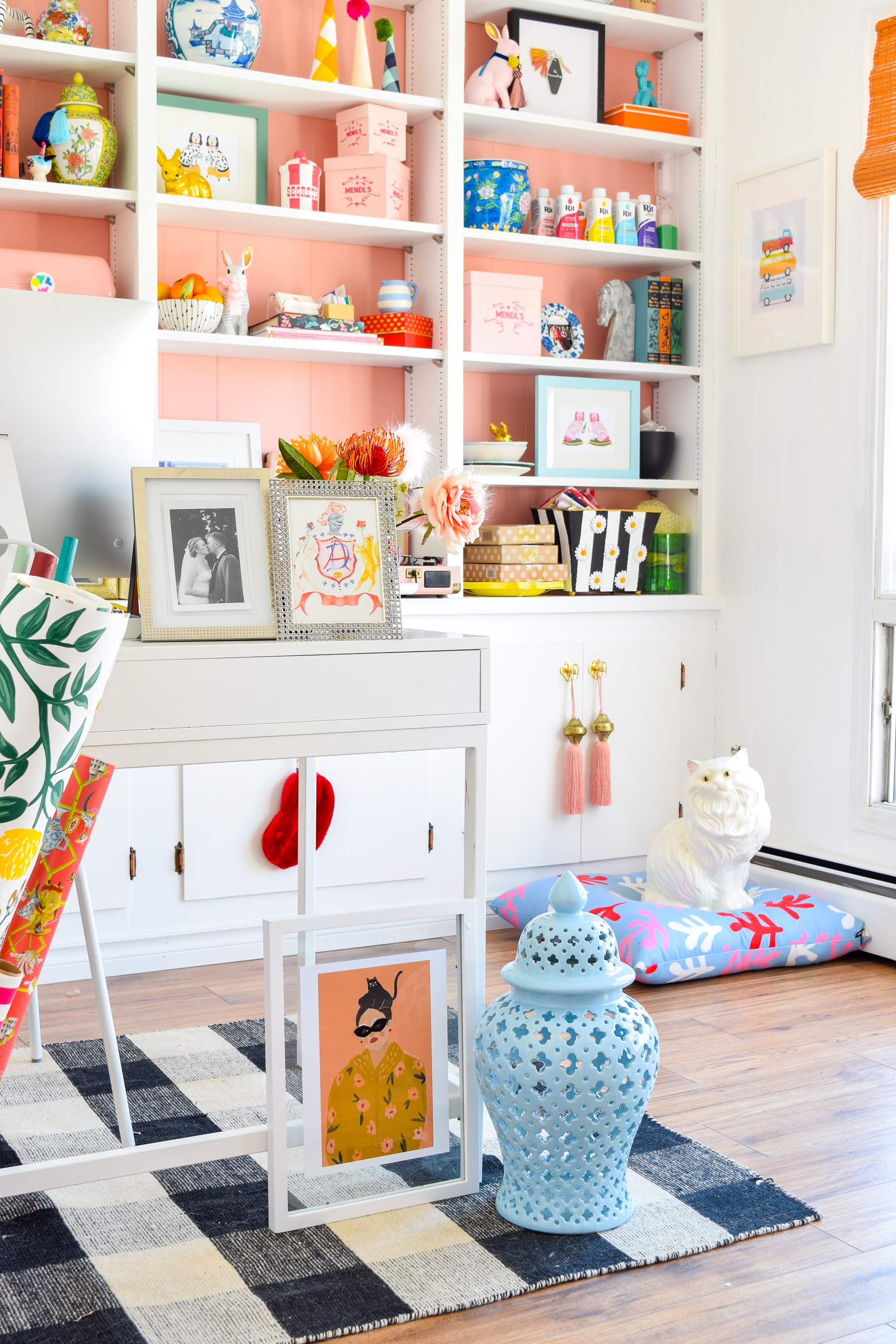 We painted our wood panelling in a bright white and Noble Blush (pink) from BEHR paint, to create a feminine and colourful home office space. 