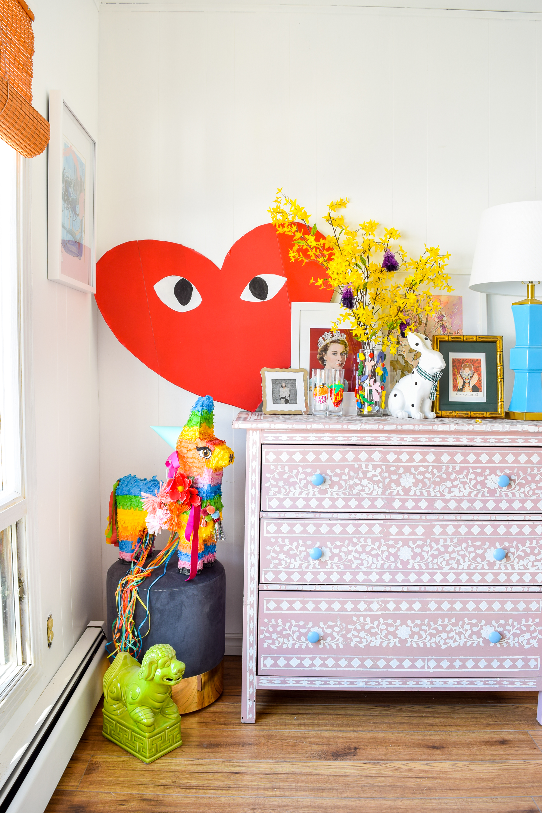 We painted our wood panelling in a bright white and Noble Blush (pink) from BEHR paint, to create a feminine and colourful home office space. We painted our wood panelling in a bright white and Noble Blush (pink) from BEHR paint, to create a feminine and colourful home office space.