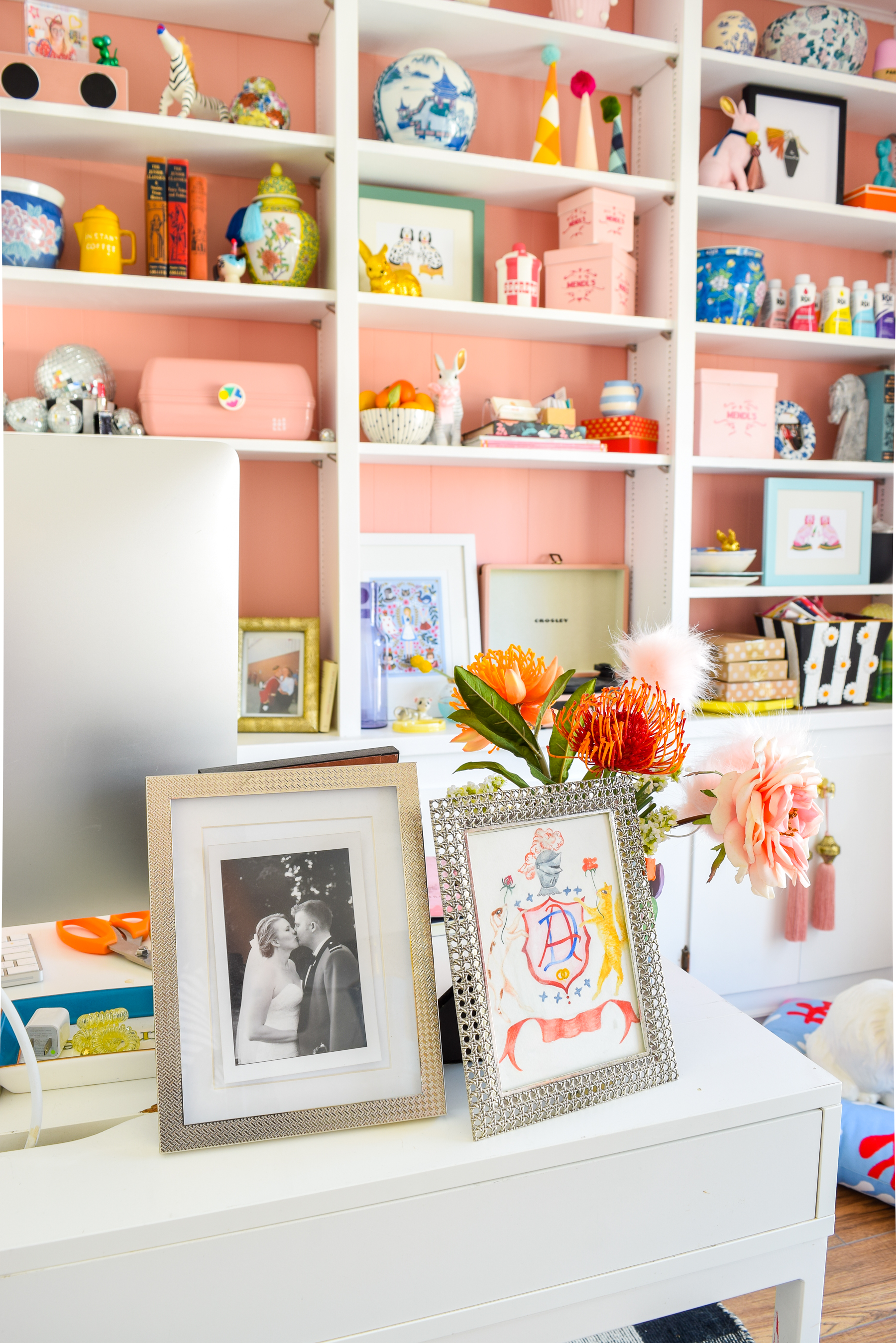 We painted our wood panelling in a bright white and Noble Blush (pink) from BEHR paint, to create a feminine and colourful home office space. 