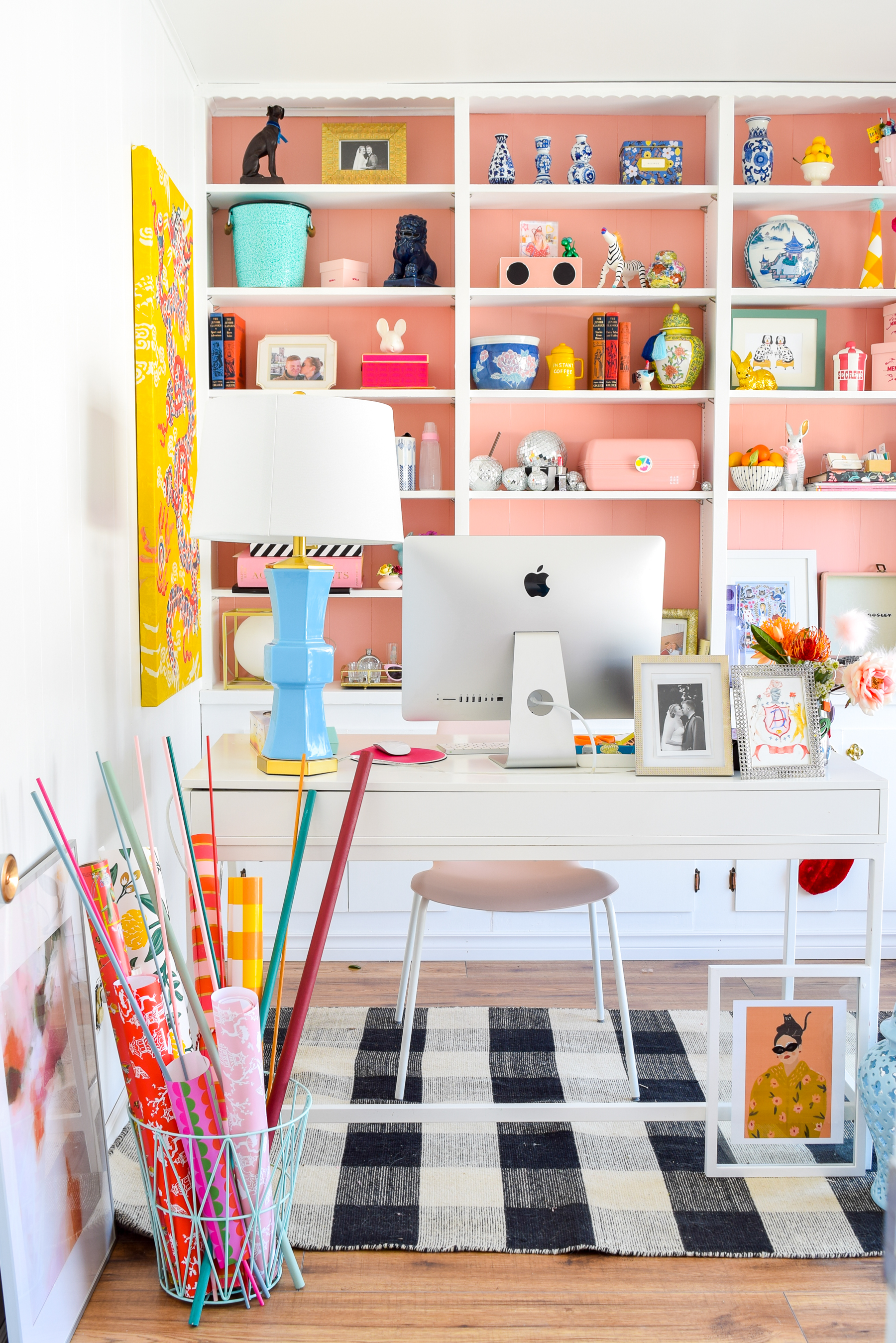 We painted our wood panelling in a bright white and Noble Blush (pink) from BEHR paint, to create a feminine and colourful home office space. 