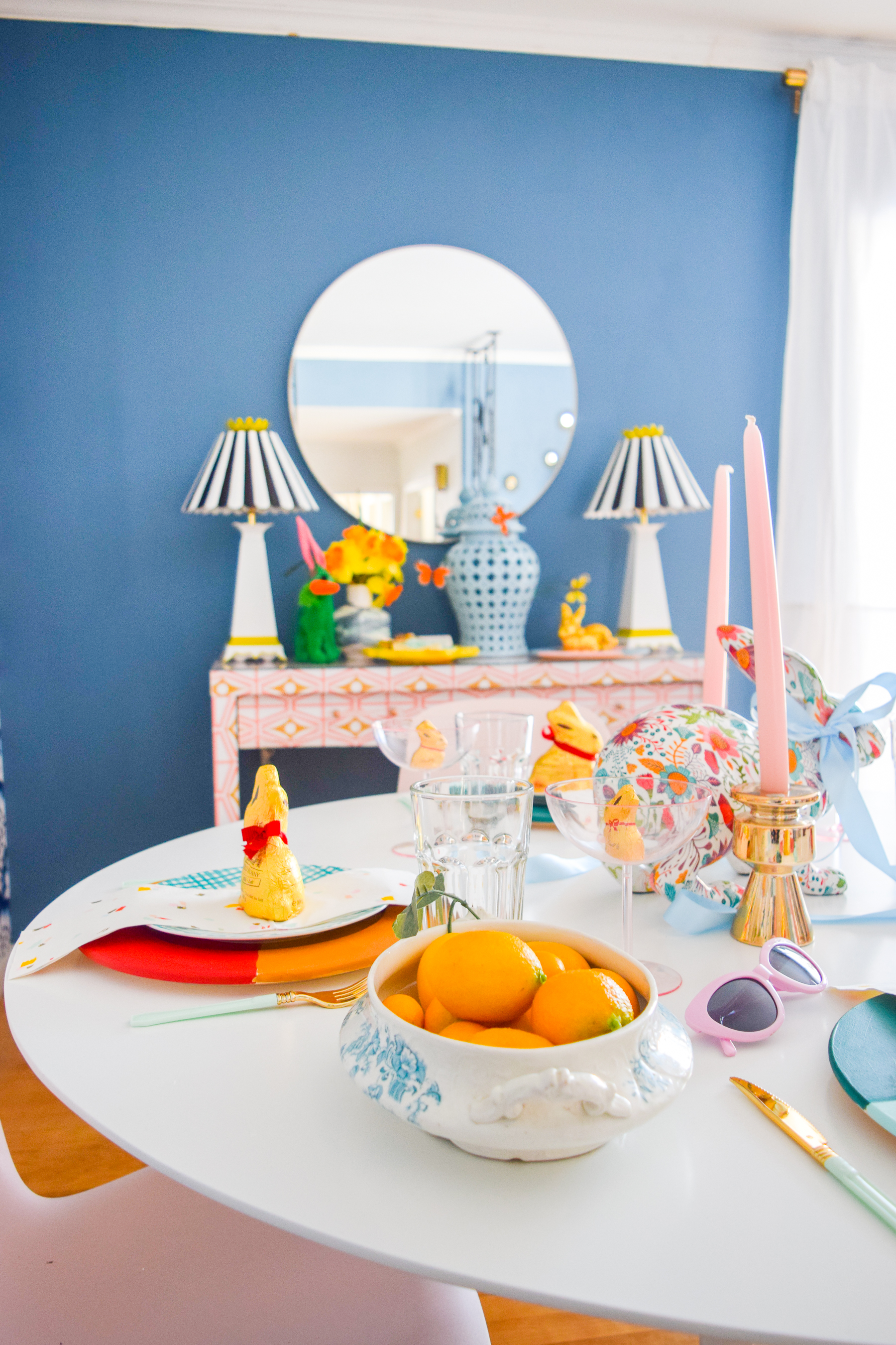 A bold & colourful easter tablescape is exactly what you need to kick start spring (in case she isn't already in bloom), and display all your chocolate too! I painted basswood chargers from Walnut Hollow with a bold colour blocked pattern, and love the result.