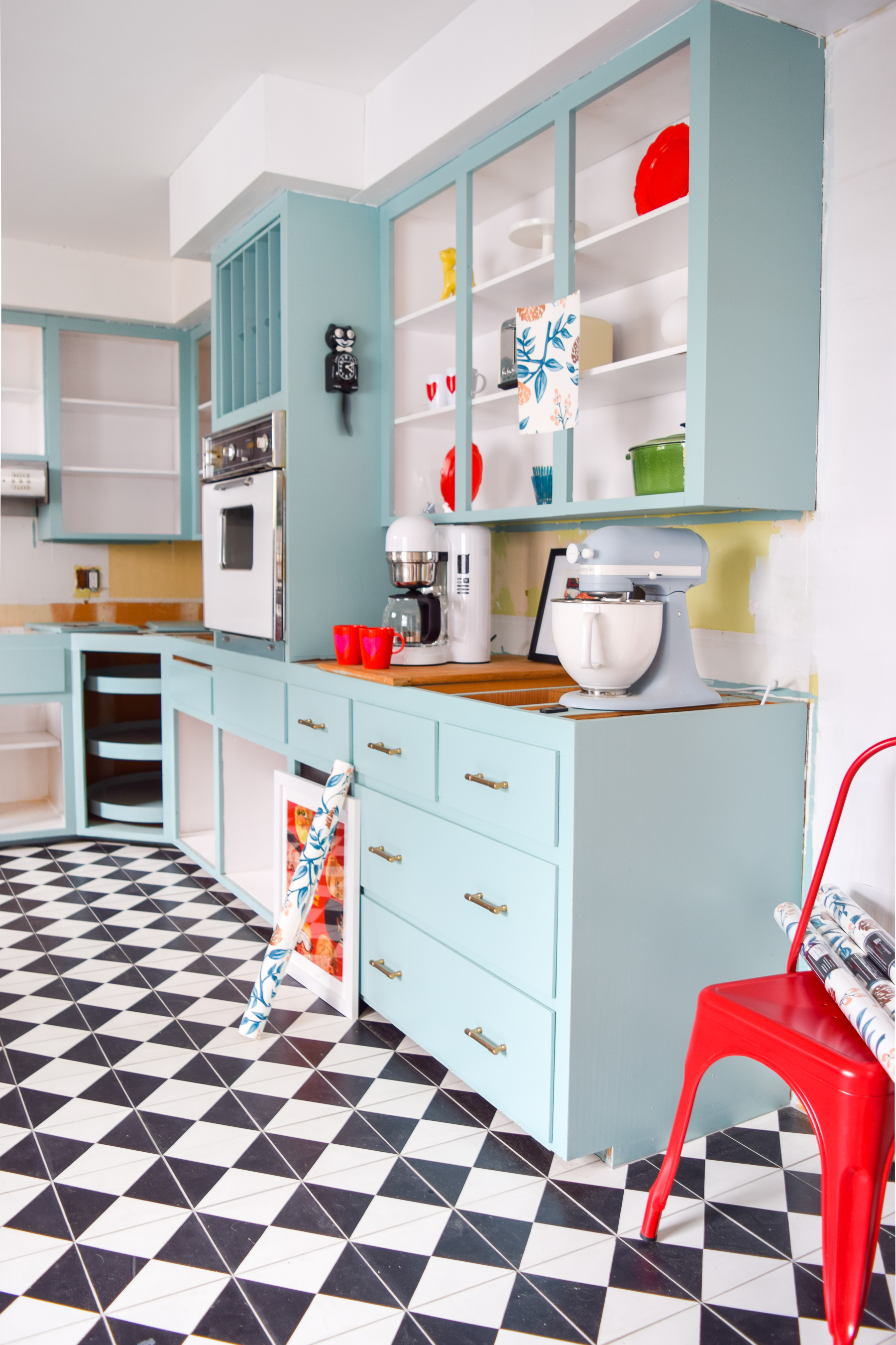 Retro glam kitchen renovation details are all tha counts! Everything from wallpaper, to light fixtures, electrical work, plumbing and more. Come see what's going on behind the scenes during Week 4 of the Spring One Room Challenge.