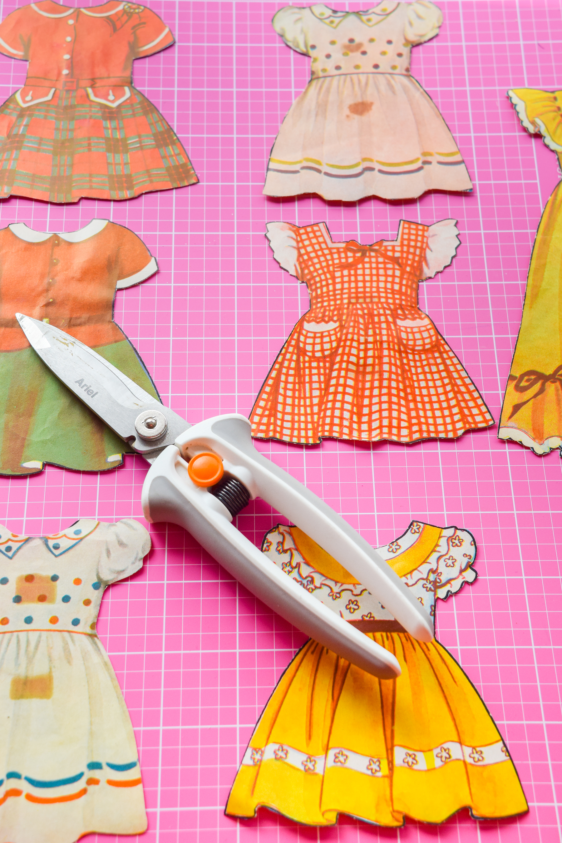 Got an old paper doll set? Add some magnetic sheeting them, and stick them to your fridge for a fun set of DIY retro doll fridge magnets.