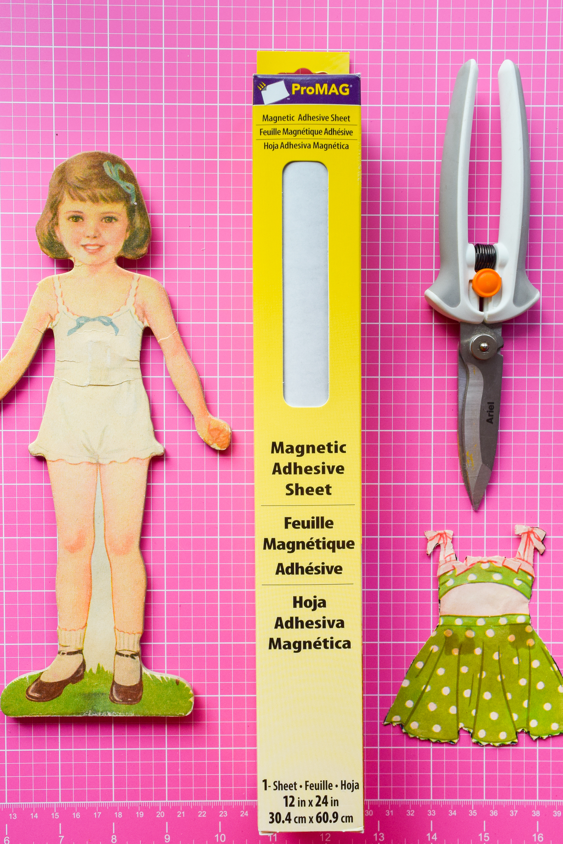 Got an old paper doll set? Add some magnetic sheeting them, and stick them to your fridge for a fun set of DIY retro doll fridge magnets.