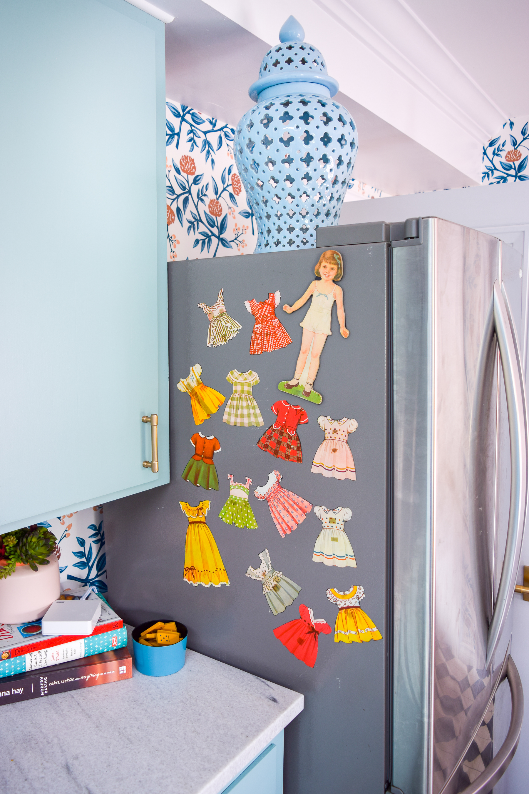 Got an old paper doll set? Add some magnetic sheeting them, and stick them to your fridge for a fun set of DIY retro doll fridge magnets.