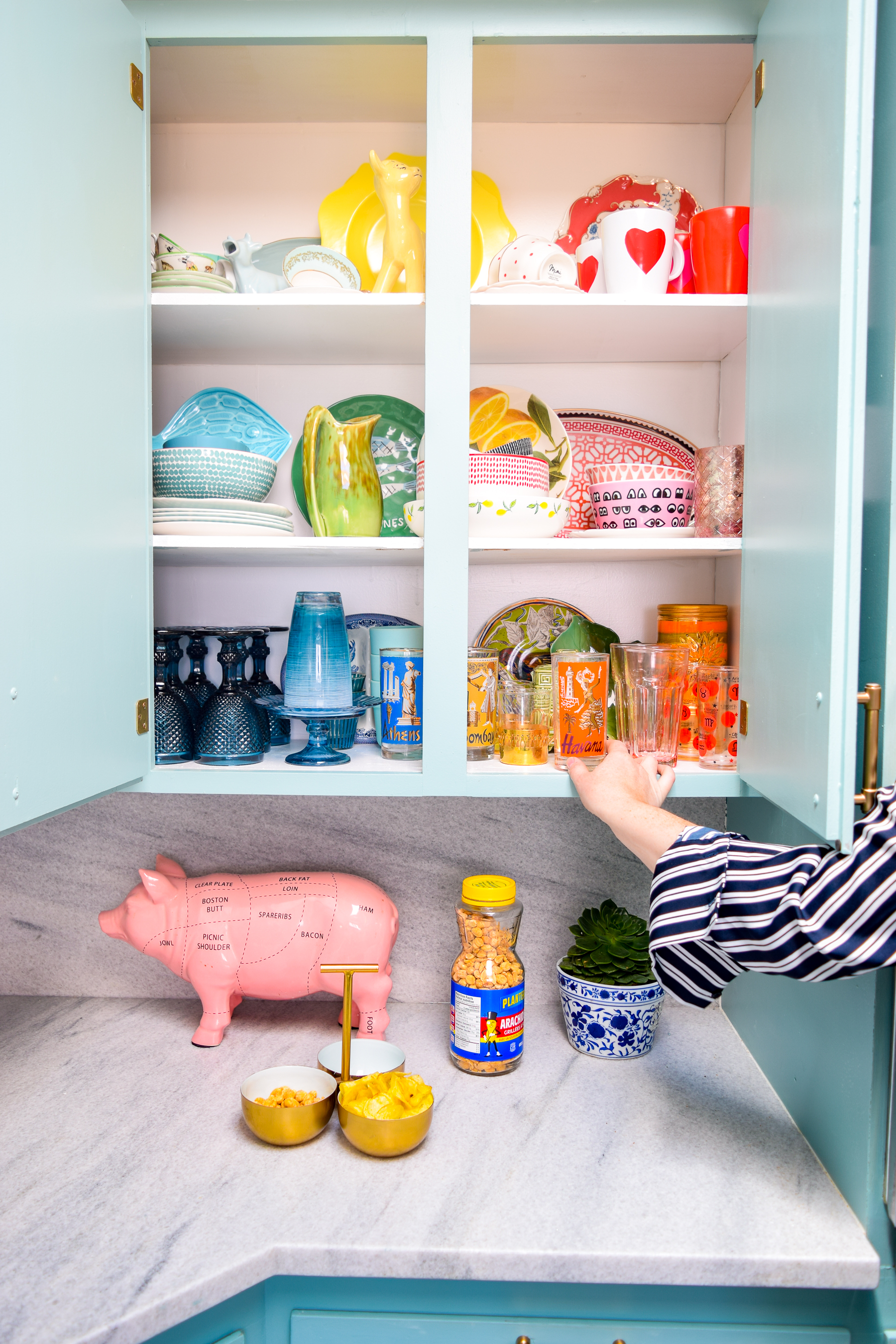 Our retro glam kitchen renovations are done! Come see how we transformed our dated kitchen, into a modern oasis, full of colour and pattern.