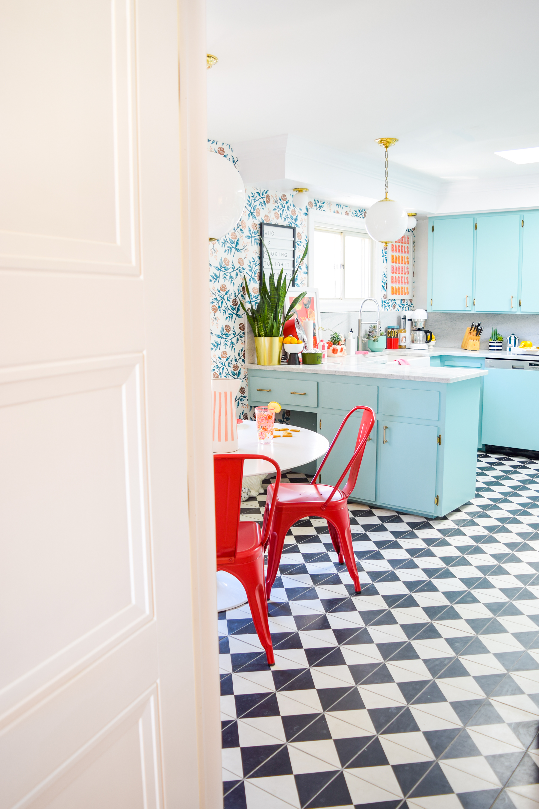 Our retro glam kitchen renovations are done! Come see how we transformed our dated kitchen, into a modern oasis, full of colour and pattern.
