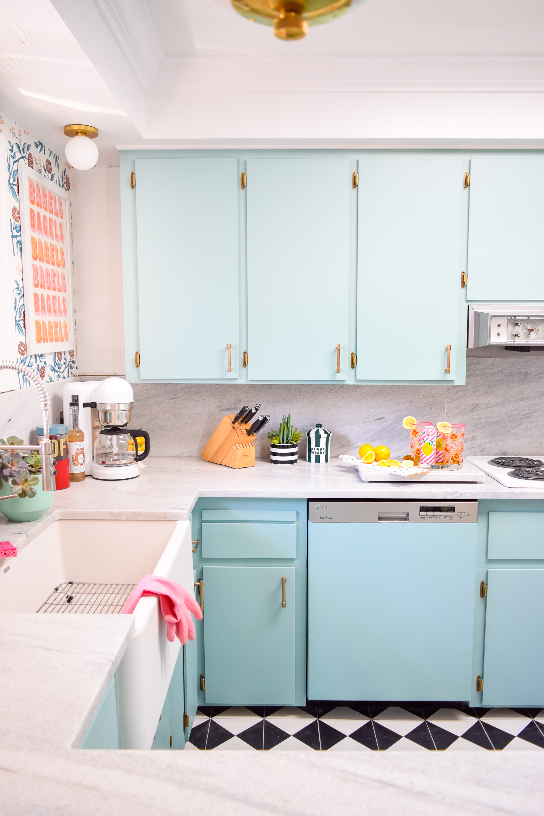 Our retro glam kitchen renovations are done! Come see how we transformed our dated kitchen, into a modern oasis, full of colour and pattern.