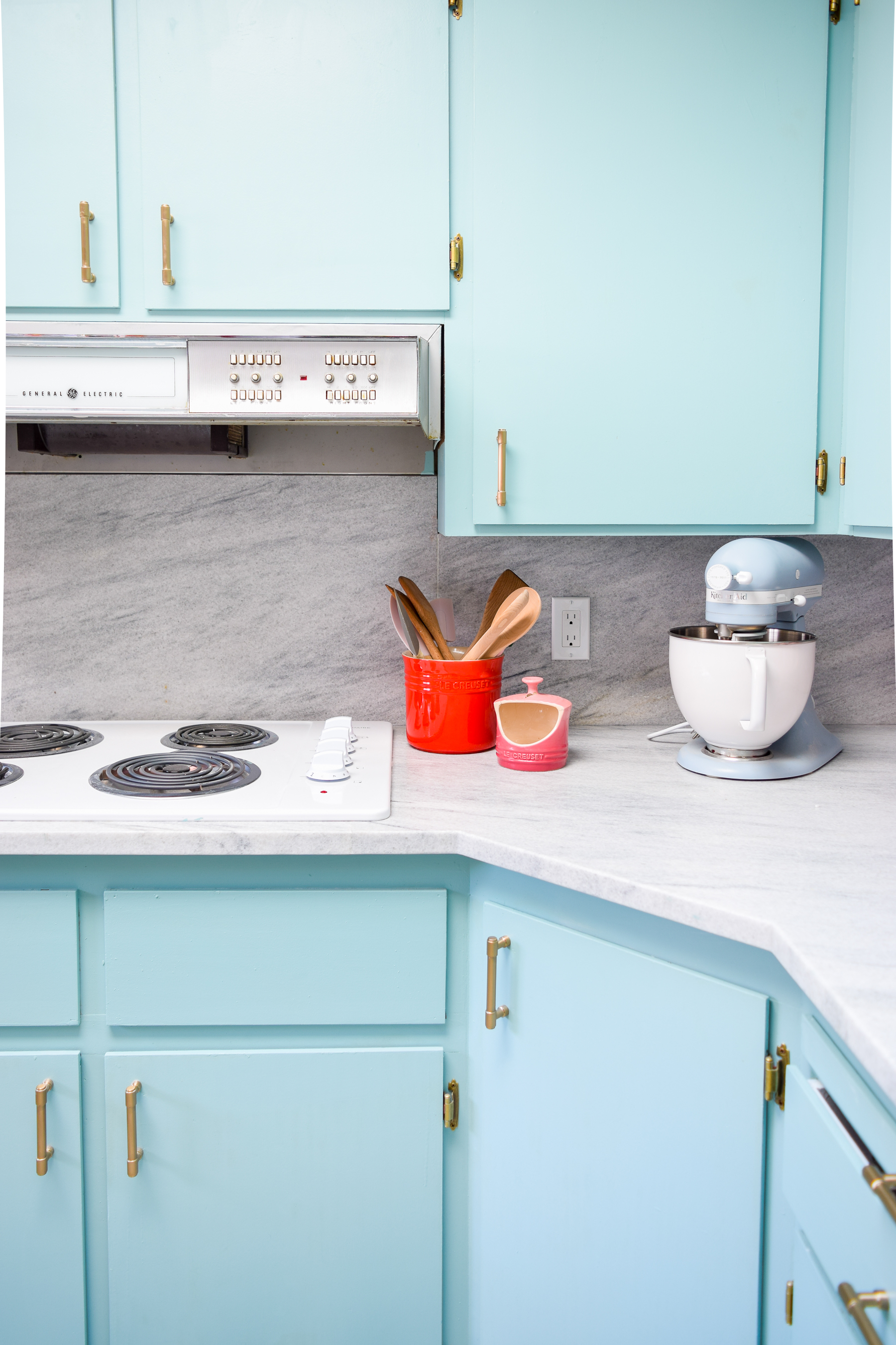 Our retro glam kitchen renovations are done! Come see how we transformed our dated kitchen, into a modern oasis, full of colour and pattern.