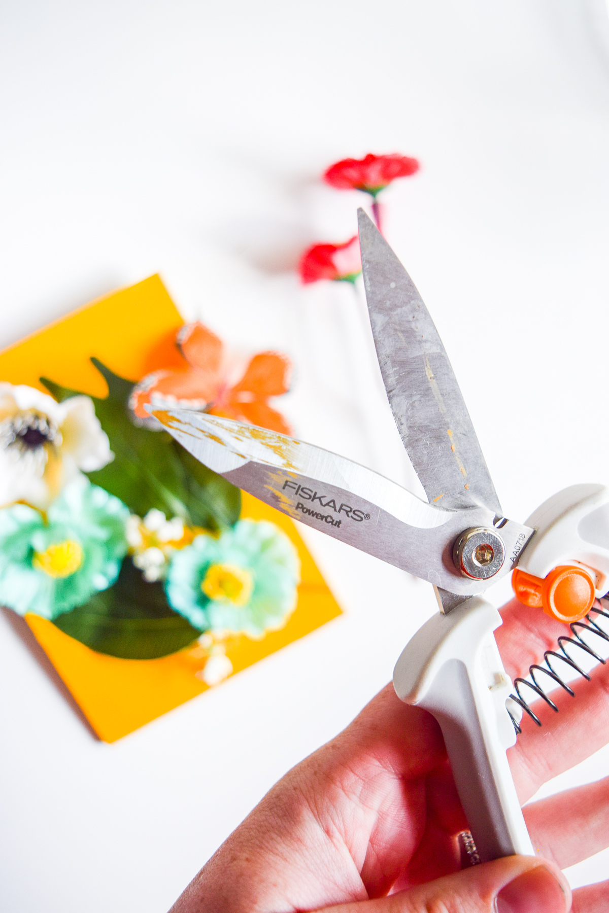 I've never done a nursery, but I do know how to make faux floral wall art - inspired by Rifle Paper Co. - and you can too! You just need the right tools. My Powercut Snips from Fiskars cut right through the wire stems, making them easy to position.