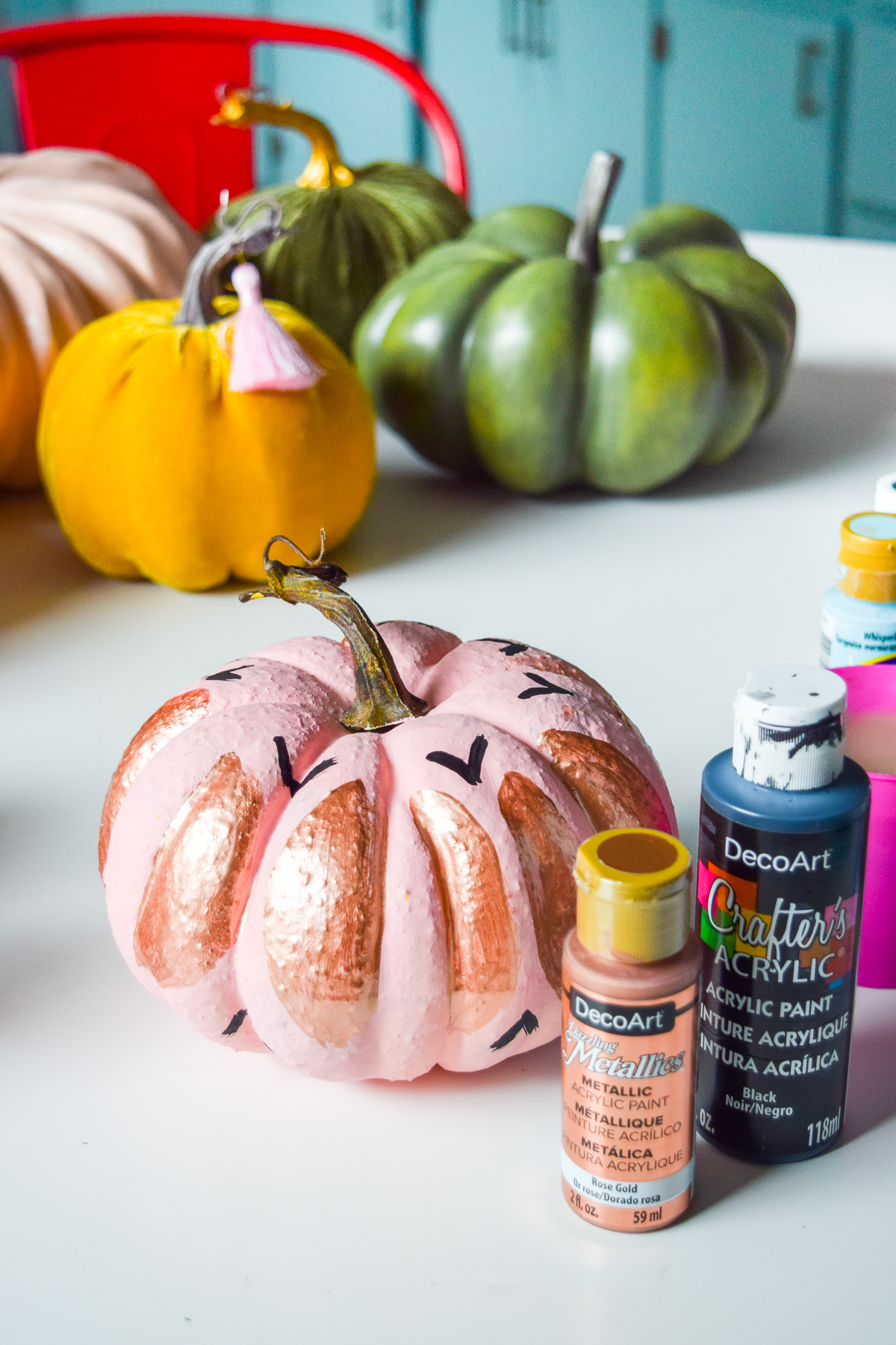 5 Colorful Pumpkin Painting Ideas that will bust you out of your creative rut, and have all your friends asking where you got such cool pumpkins this year. Using DecoArt's acrylic paints you can easily transfrom and re-use crafting pumpkins to create bold pops of colour.