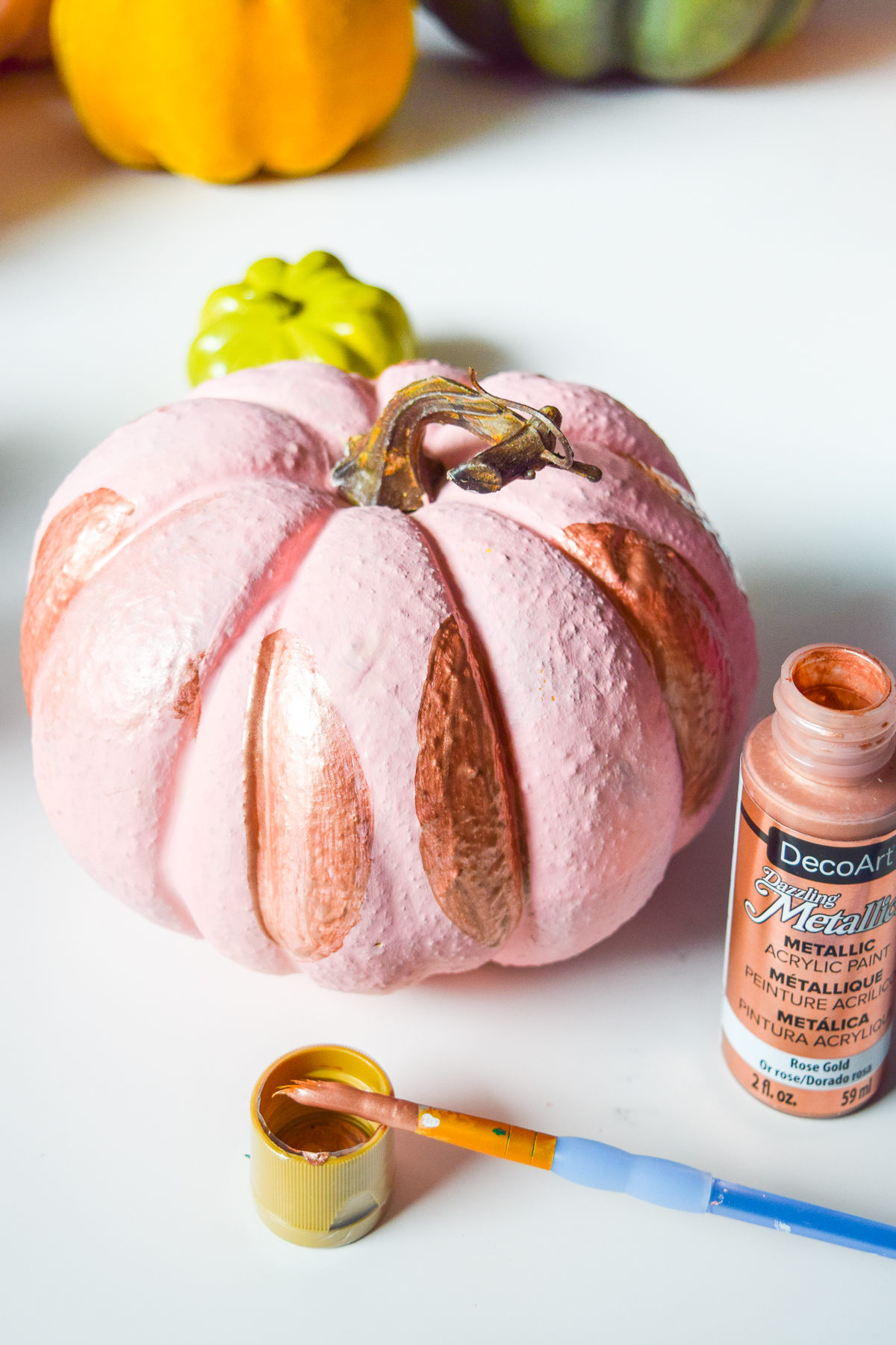 5 Colorful Pumpkin Painting Ideas that will bust you out of your creative rut, and have all your friends asking where you got such cool pumpkins this year. Using DecoArt's acrylic paints you can easily transfrom and re-use crafting pumpkins to create bold pops of colour.