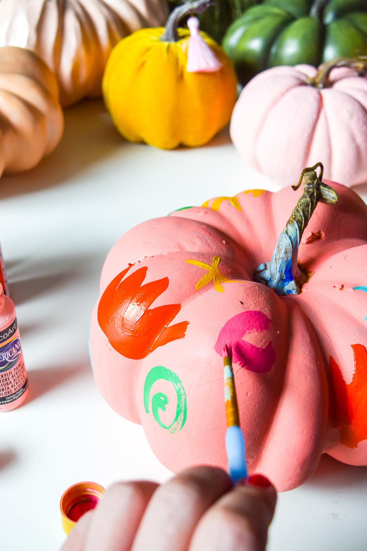 5 Colorful Pumpkin Painting Ideas that will bust you out of your creative rut, and have all your friends asking where you got such cool pumpkins this year. Using DecoArt's acrylic paints you can easily transfrom and re-use crafting pumpkins to create bold pops of colour.