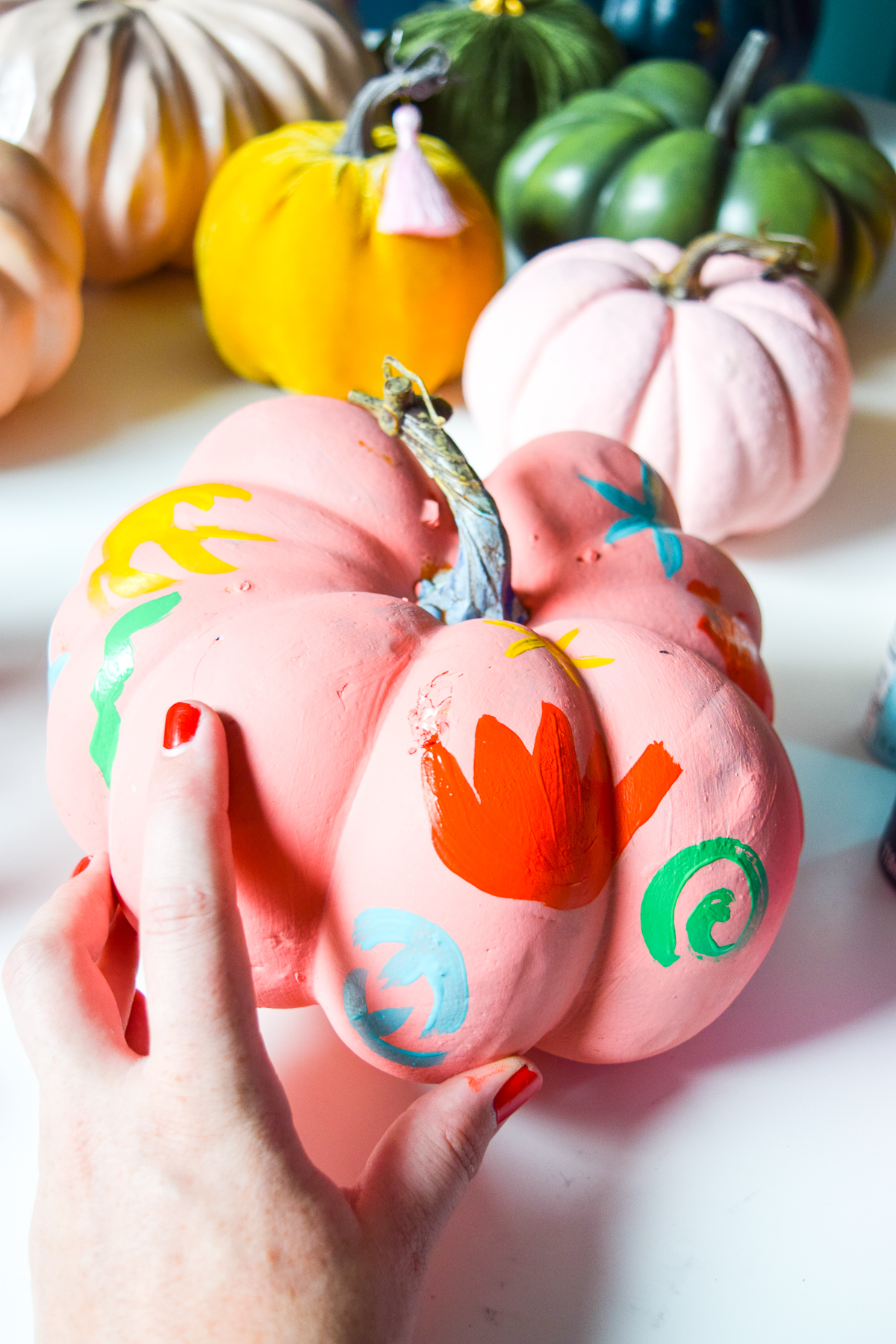 5 Colorful Pumpkin Painting Ideas that will bust you out of your creative rut, and have all your friends asking where you got such cool pumpkins this year. Using DecoArt's acrylic paints you can easily transfrom and re-use crafting pumpkins to create bold pops of colour.