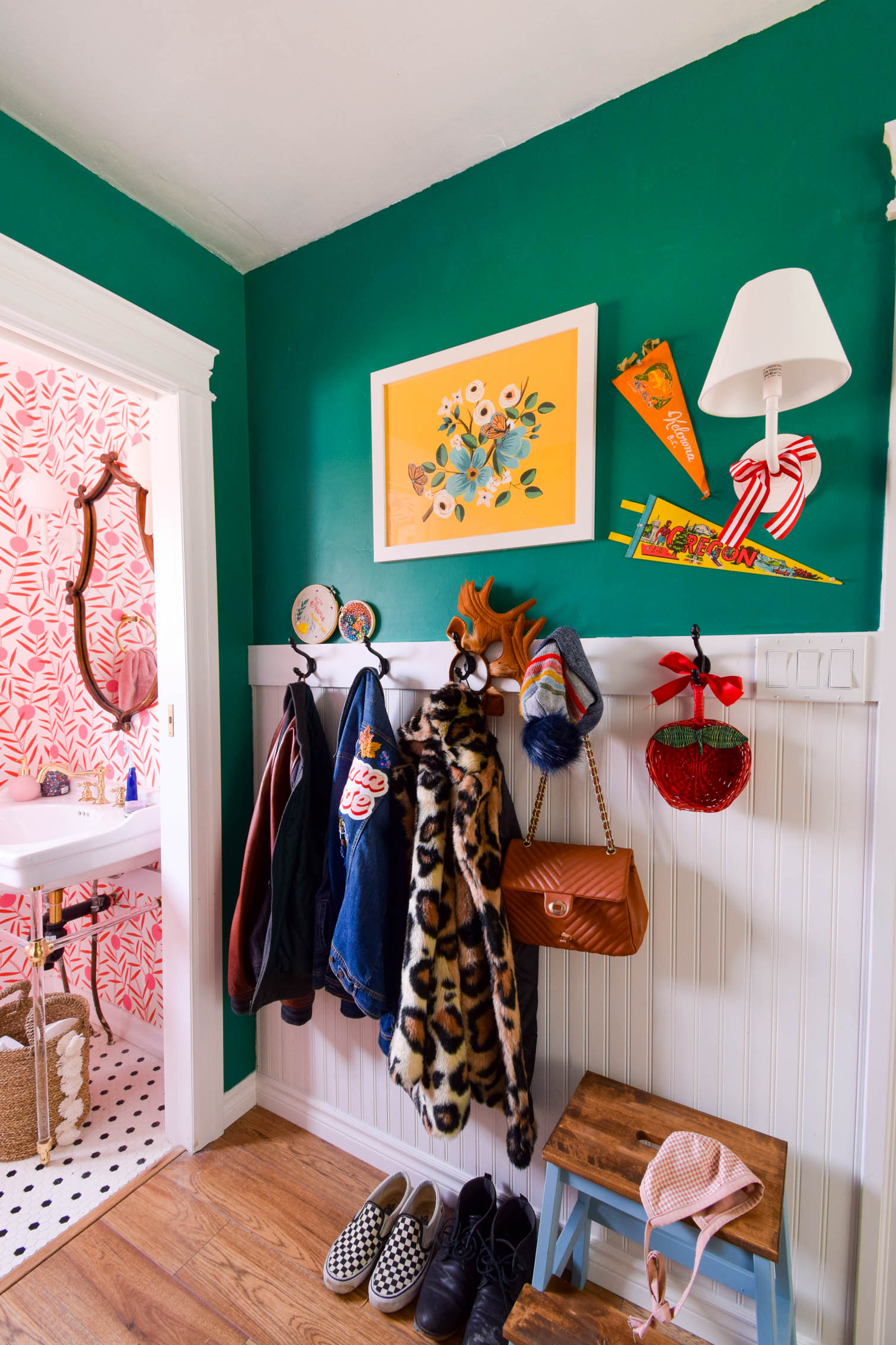 This shared mud room and colorful vintage laundry room, is the perfect antidote to the boring white spaces. Life is colorful, and so are these spaces.