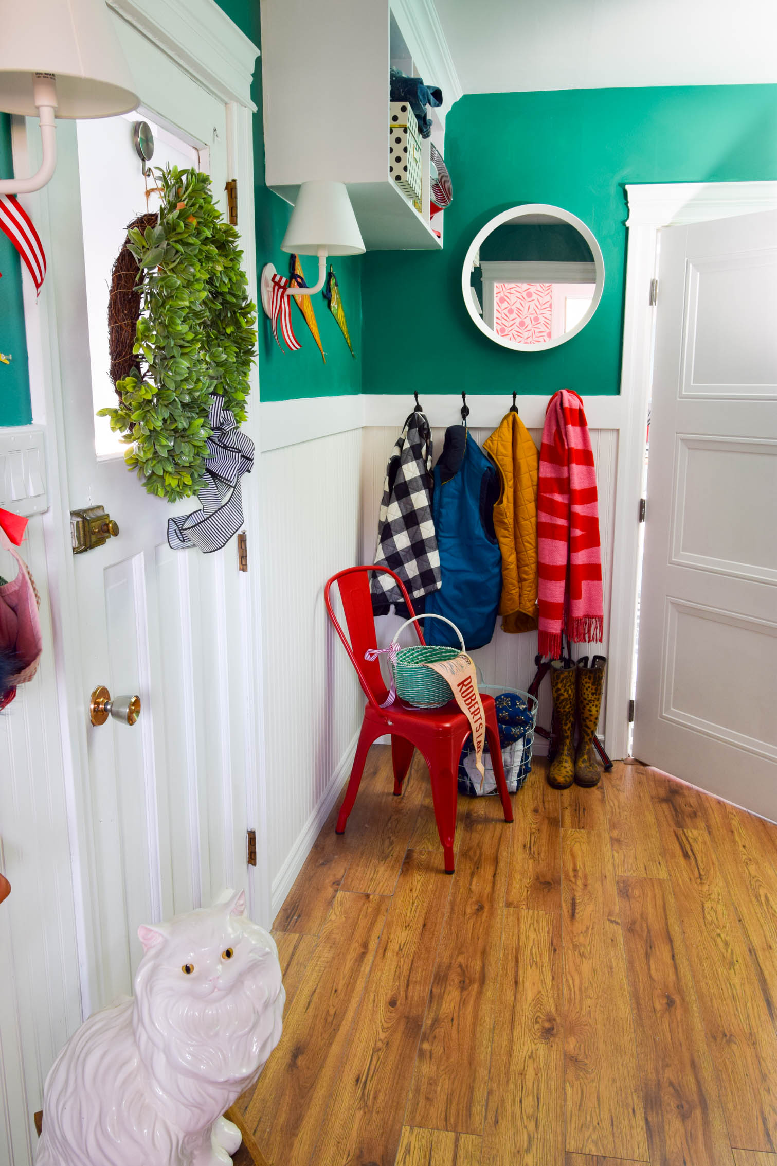 vintage laundry room decor is just what our space was missing! Colourful pennants and baskets, thrifted finds, and more! Come see how we added a retro touch.