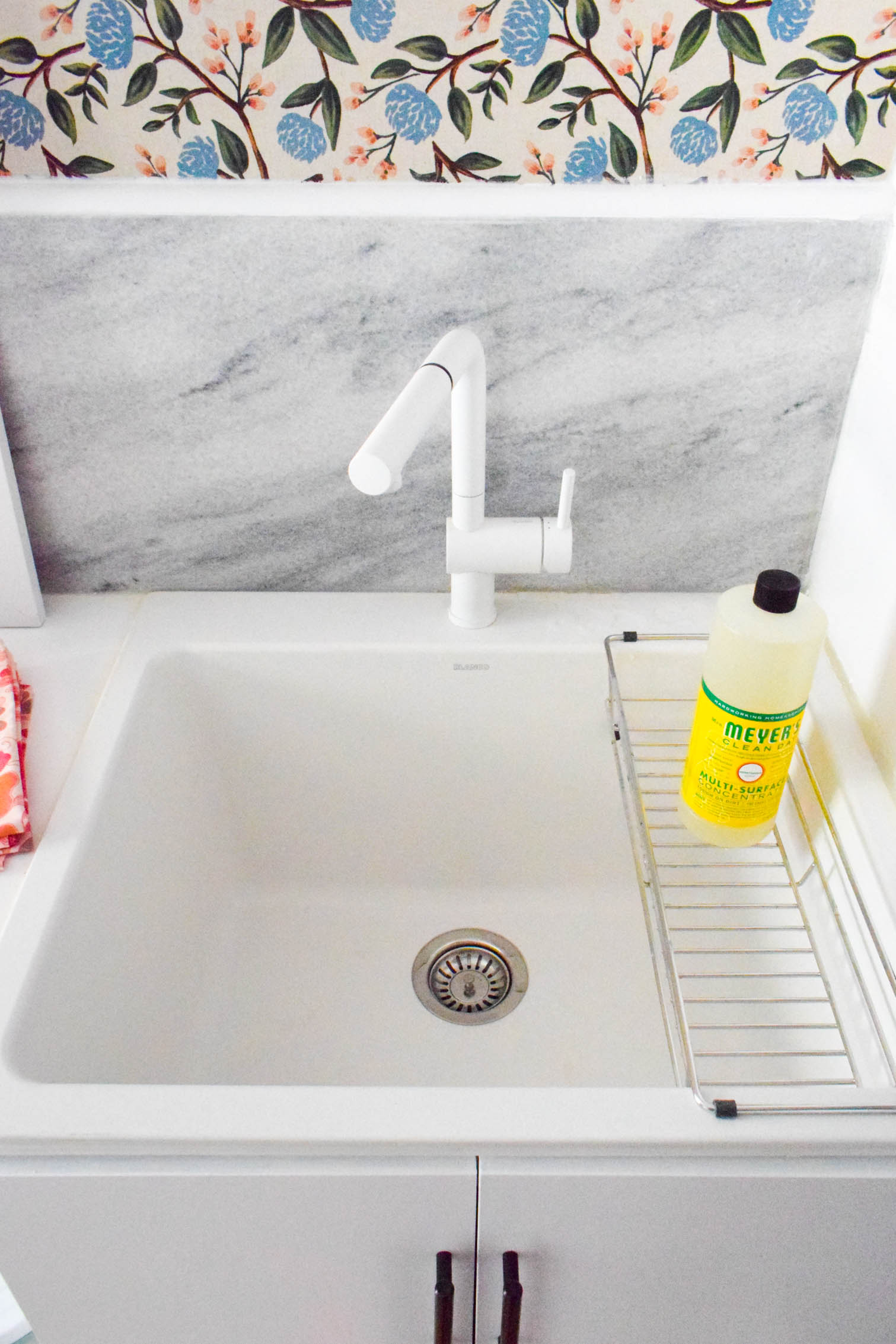 This shared mud room and colorful vintage laundry room, is the perfect antidote to the boring white spaces. Life is colorful, and so are these spaces.