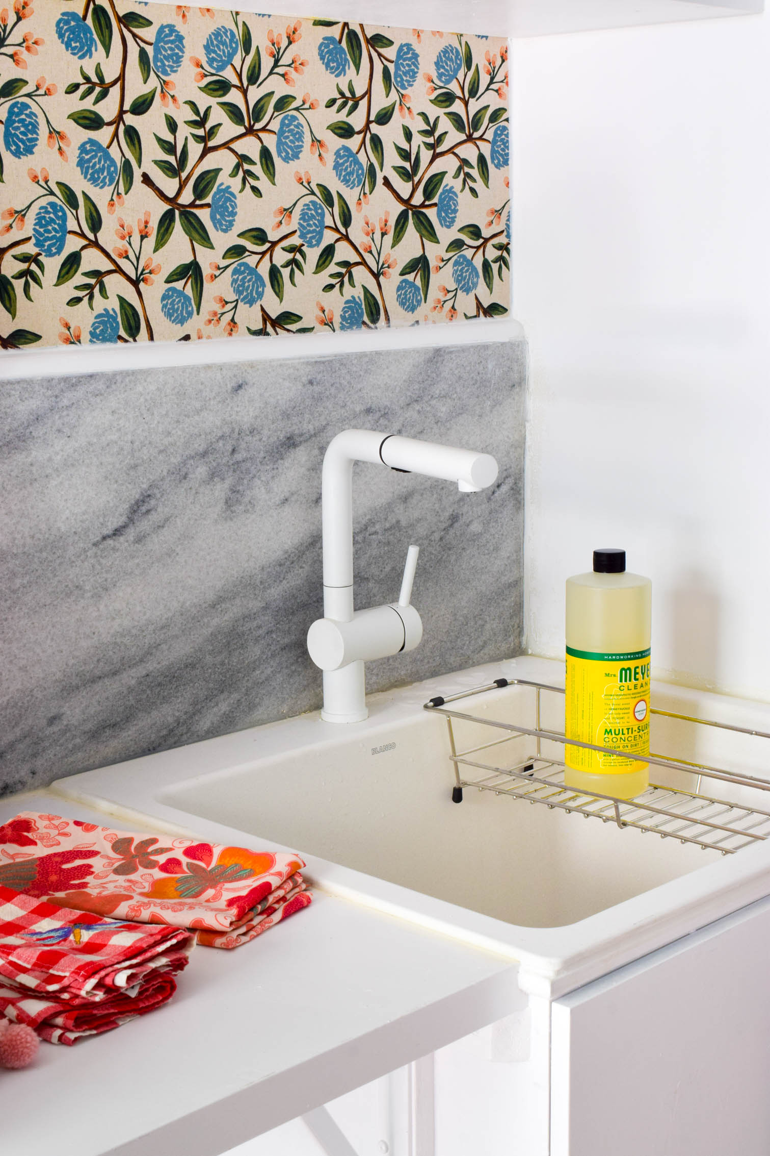 This shared mud room and colorful vintage laundry room, is the perfect antidote to the boring white spaces. Life is colorful, and so are these spaces.