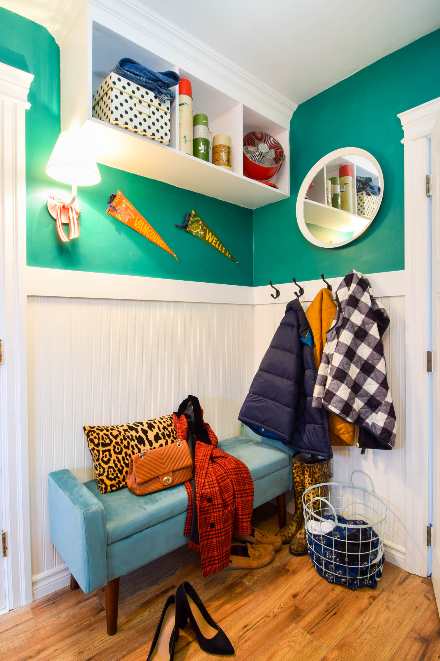 This shared mud room and colorful vintage laundry room, is the perfect antidote to the boring white spaces. Life is colorful, and so are these spaces.