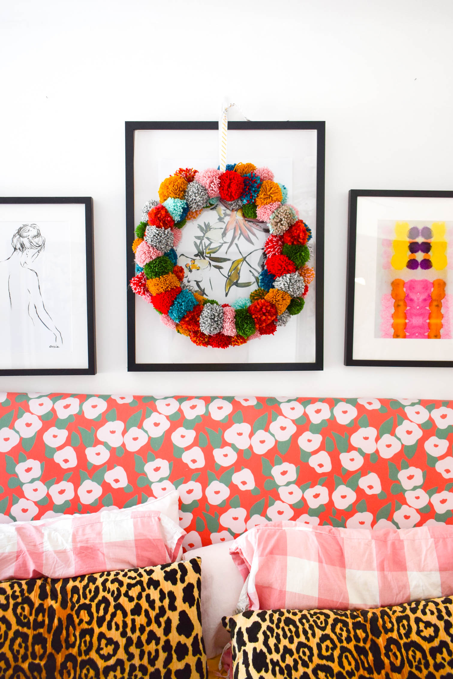 Make your own pom pom wreath this holiday season, and add a bold statement to your decor. This wreath is easy to make and a lot of fun to put together.