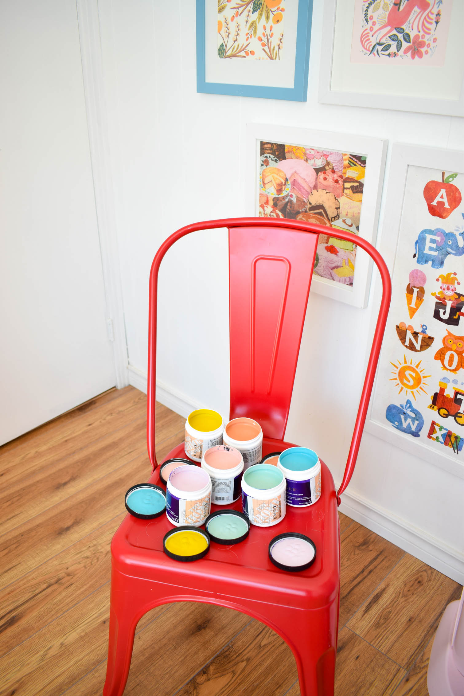 A DIY rainbow nursery door is how you nail two trends in one project! Get rainbows and murals all in one, and add a major pop of color to any space.