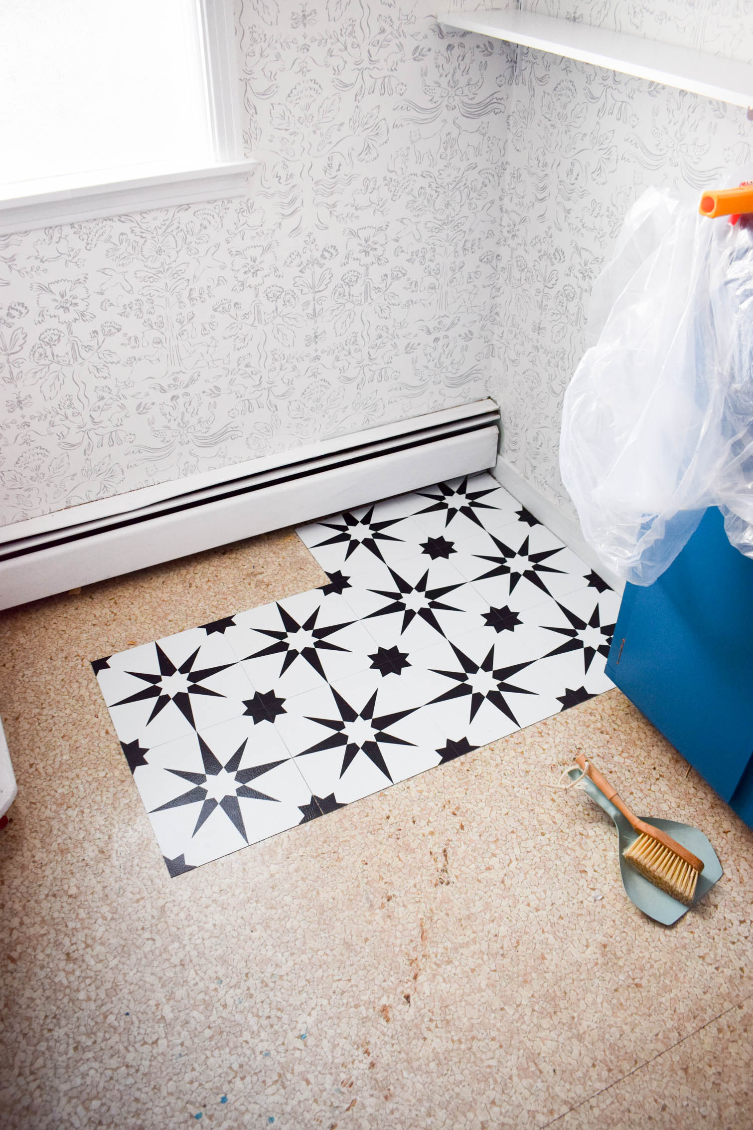 Peel and stick floor tiles are here, and they are the future! They're the perfect solution for renters, budget constraints, or if you just want a new look without the hassle of mortar and grout. My tips on How to install peel and stick floor tiles will show you how easy it is.