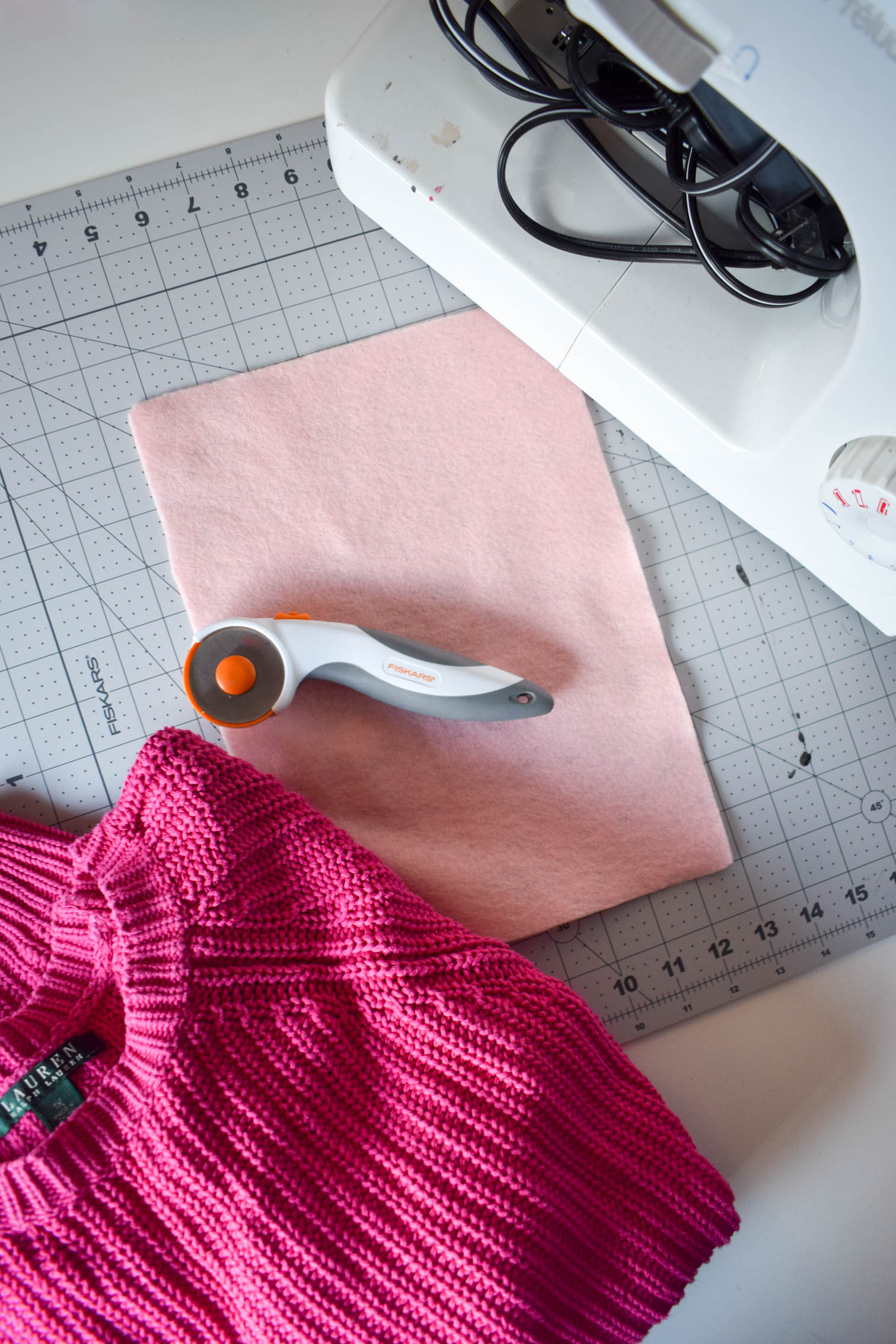 DIY Heart elbow patches are the easiest way to refashion a sweater. Using felt and a needle + thread, you can add adorable style in a few minutes to any top