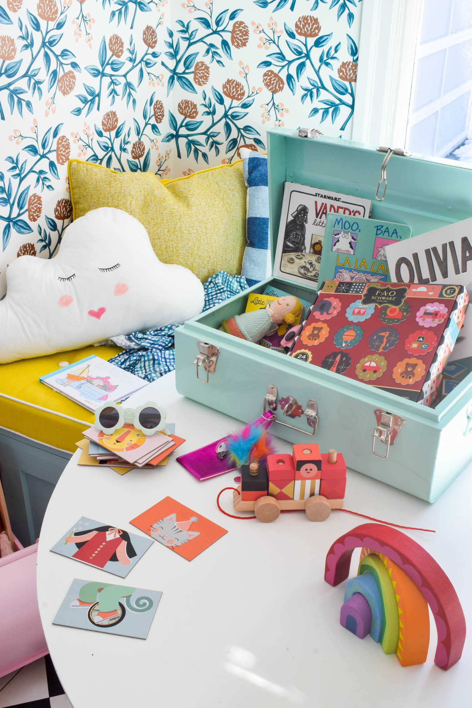 Creating stimulating and enriching activities for a baby can't be tricky, so I've created a toy box full of colourful baby play time ideas.